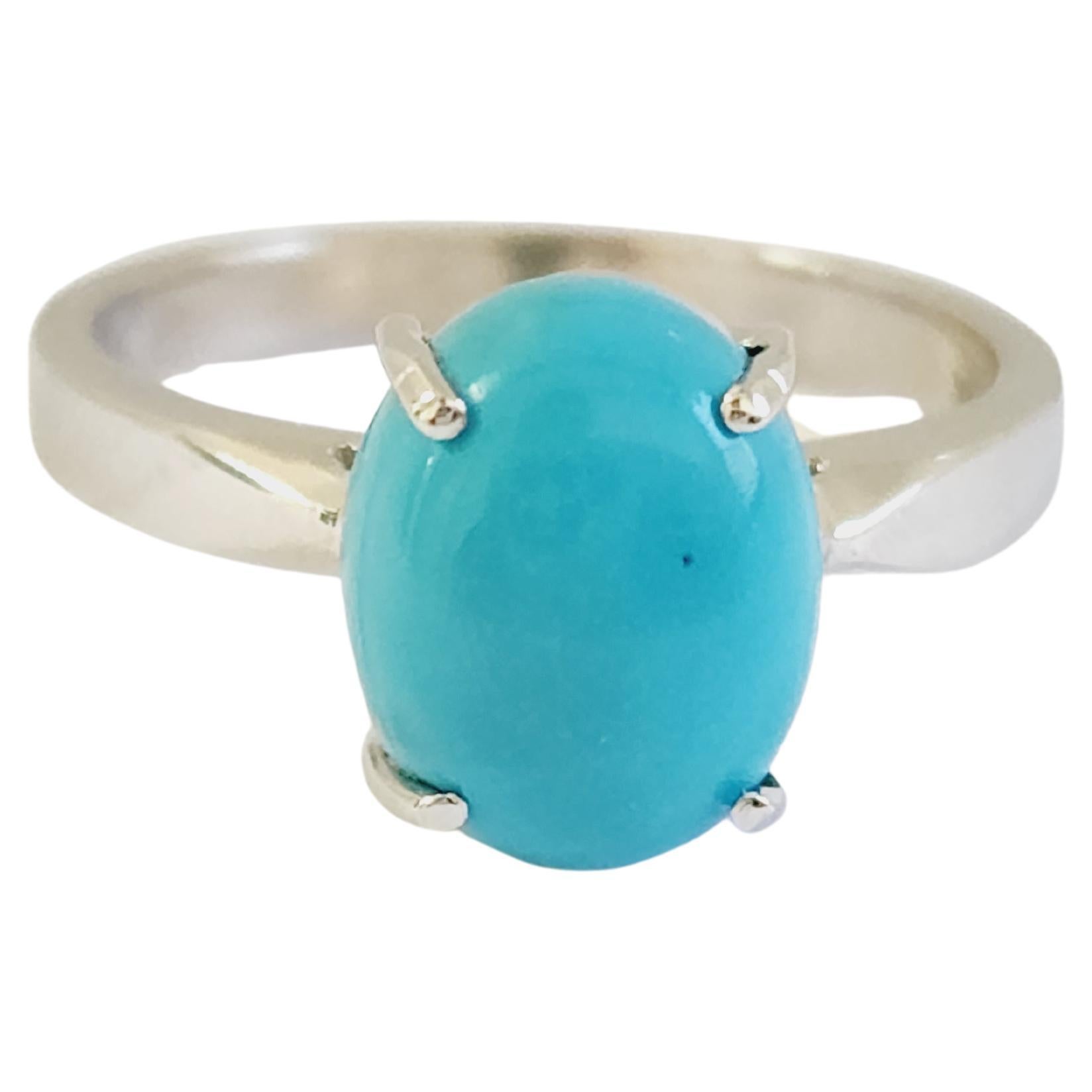1.50 Carat Oval Shape Turquoise 14 Karat White Gold Ring For Sale