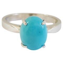 1.50 Carat Oval Shape Turquoise 14 Karat White Gold Ring