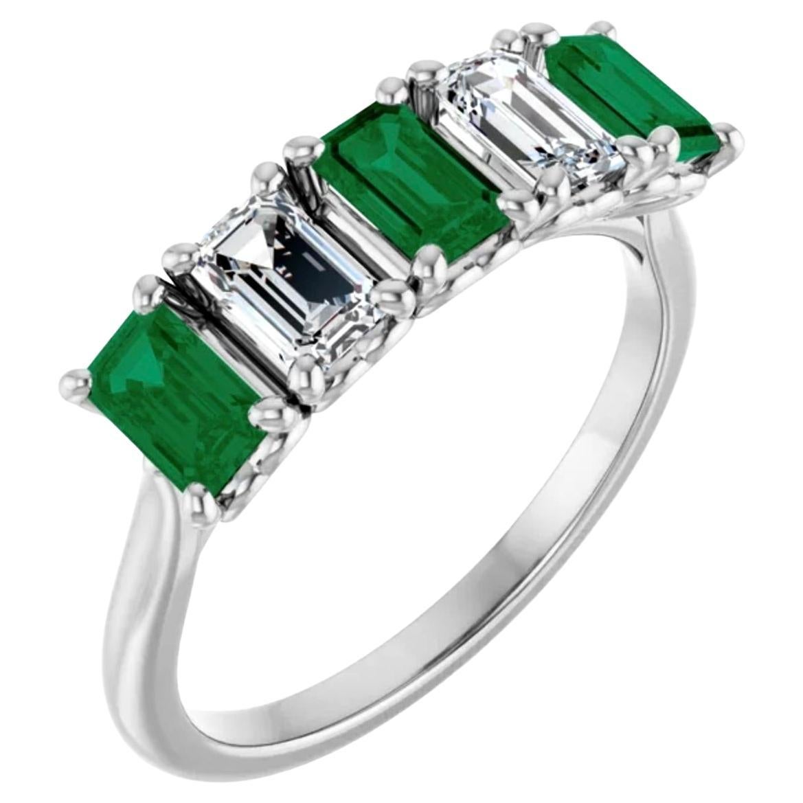 Platinum shared prong ring featuring emerald cut AAA+ Colombian emerald and diamonds.
Solid Platinum
Diamonds approx. .60ctw., G/VS1
AAA Colombian Emerald approx. .90ctw.
Size 7

We specialize in Colombian emerald jewelry, and we have been in the