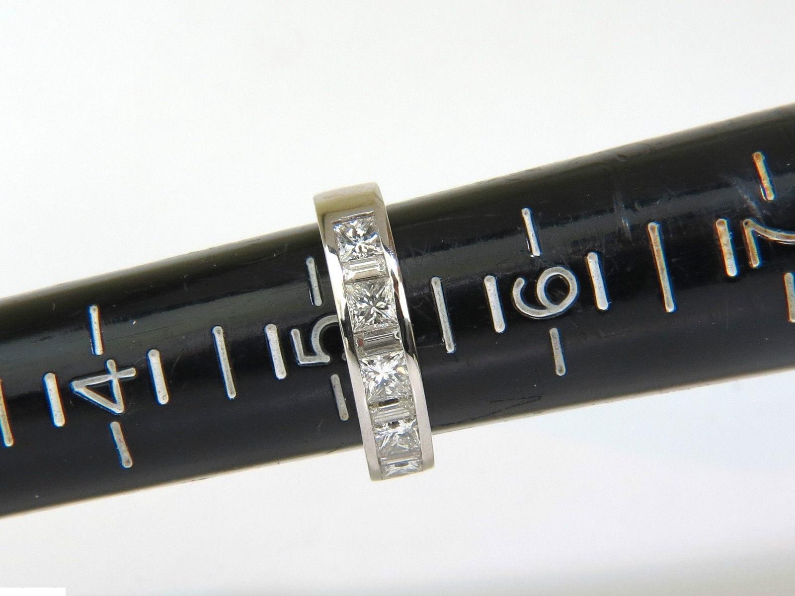 Baguettes & princess' band



1.50ct. Natural Diamonds 

Full cuts & Faceted brilliant

H-color, Vs-1 clarity

Platinum

7.5 grams



current ring size: 

5.25

& 

possible to resize, please inquire 

Ring is 4.5 mm wide



$6000 appraisal will