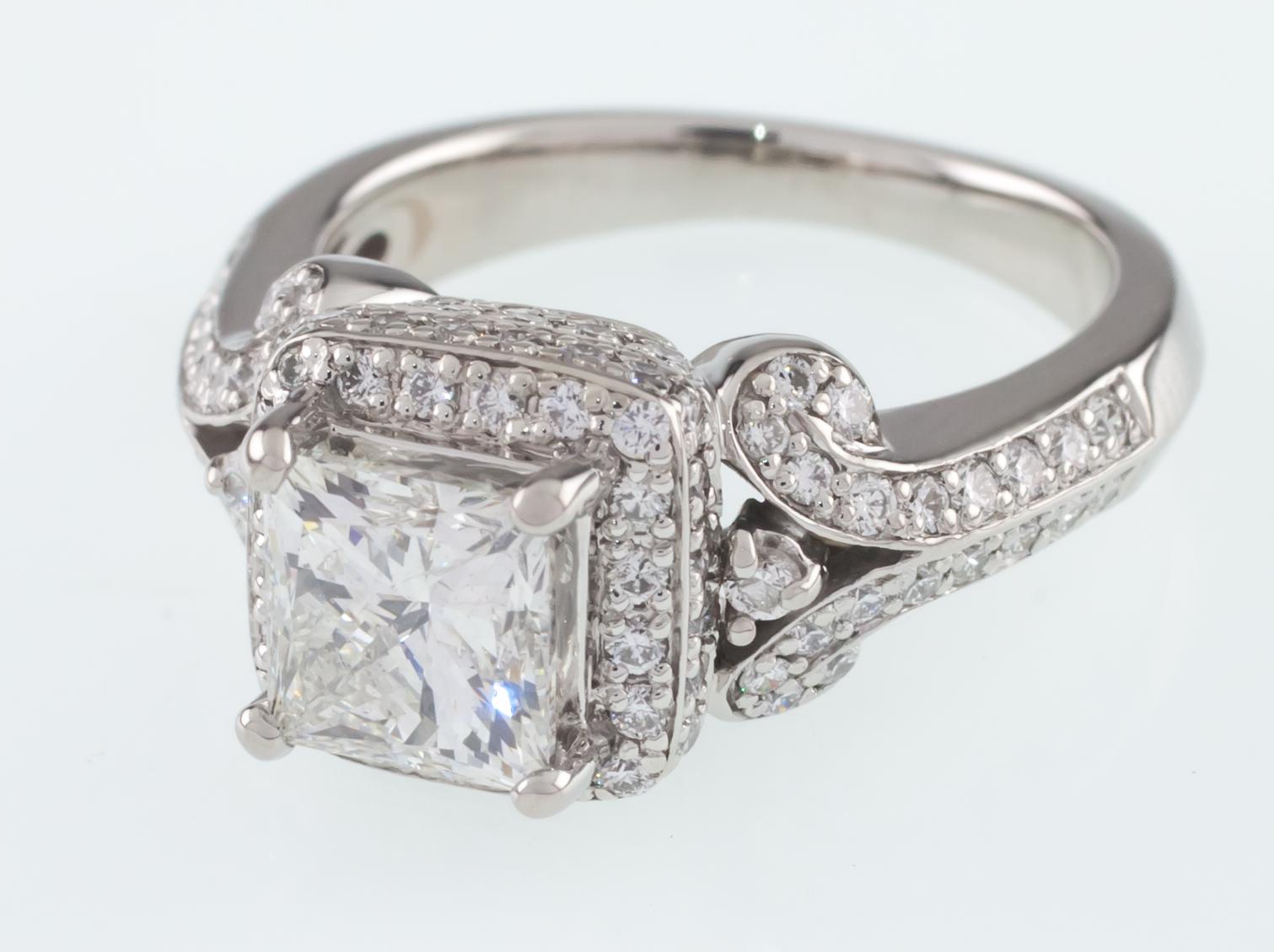 Modern 1.50 Carat Princess Cut Diamond Solitaire Ring with Accent Stones in Platinum For Sale
