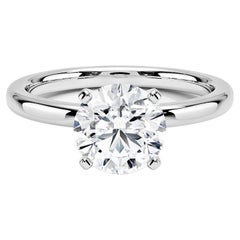 Bague à 4 griffes en or blanc 14 carats avec diamants ronds de 1,50 carat