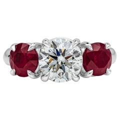1.50 Carat Round Diamond and Ruby Three-Stone Engagement Ring