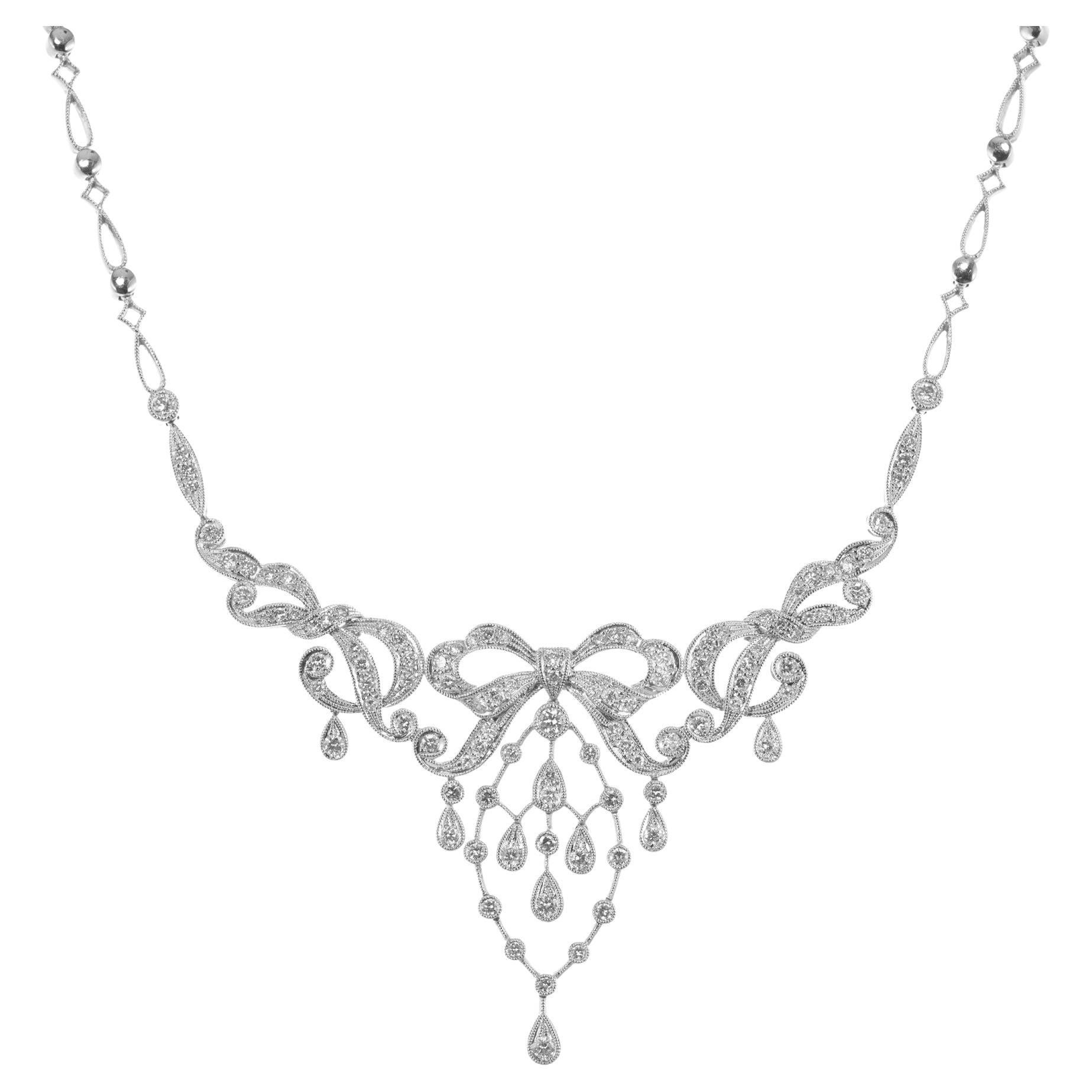 1.50 Carat Round Diamond White Gold Bow Pendant Necklace For Sale