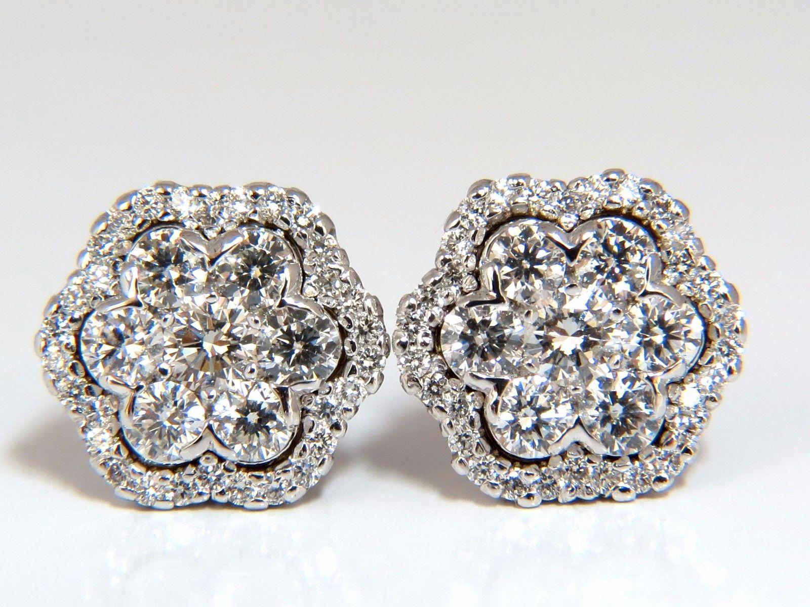 Cluster & Halo Stud Earrings.

1.50cts of natural round diamonds: 

G-color, Vs-2  clarity.

14kt. white gold

4.4 grams.

Earrings measure: .45 inch Diameter

Comfortable Stud closure

$6,000 Appraisal Certificate to accompany