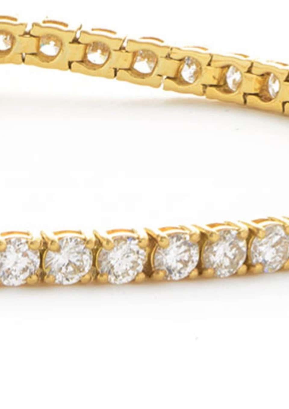 Modern 1.50 Carat Tennis Line Round Diamond 18 Karat Gold Four Claw Riviera Bracelet For Sale