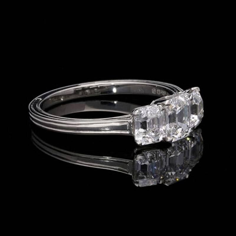 Contemporary 1.50 Carat Three-Stone Emerald-Cut Diamond Ring Set in Platinum