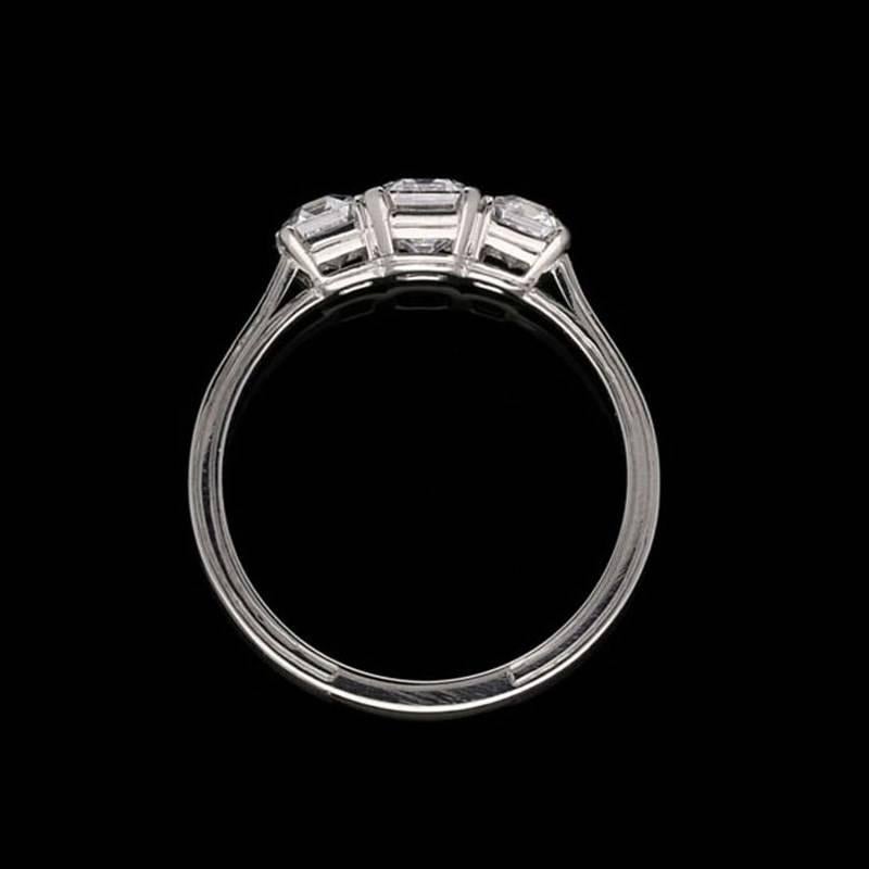 1.50 Carat Three-Stone Emerald-Cut Diamond Ring Set in Platinum In Good Condition In London, GB