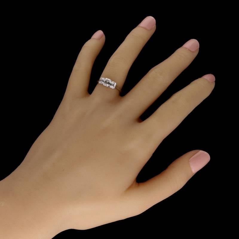 Women's 1.50 Carat Three-Stone Emerald-Cut Diamond Ring Set in Platinum