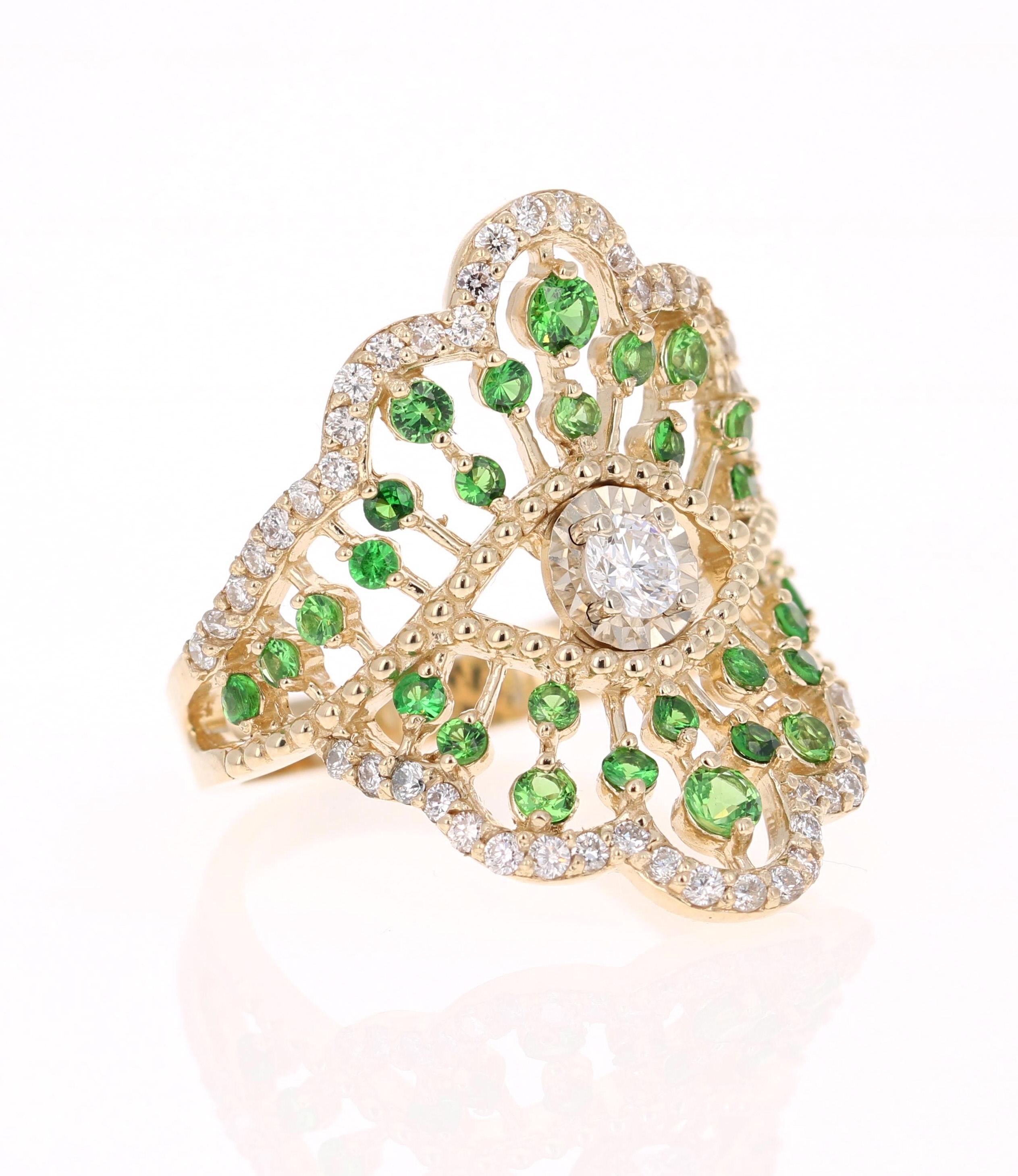 This unique cocktail ring has 30 Tsavorites that weigh 0.80 Carats and 55 Round Cut Diamonds that weigh 0.70 Carats. The total carat weight of the ring is 1.50 Carats. 

The ring is made in 14K Yellow Gold and weighs approximately 5.8 grams. 

 It