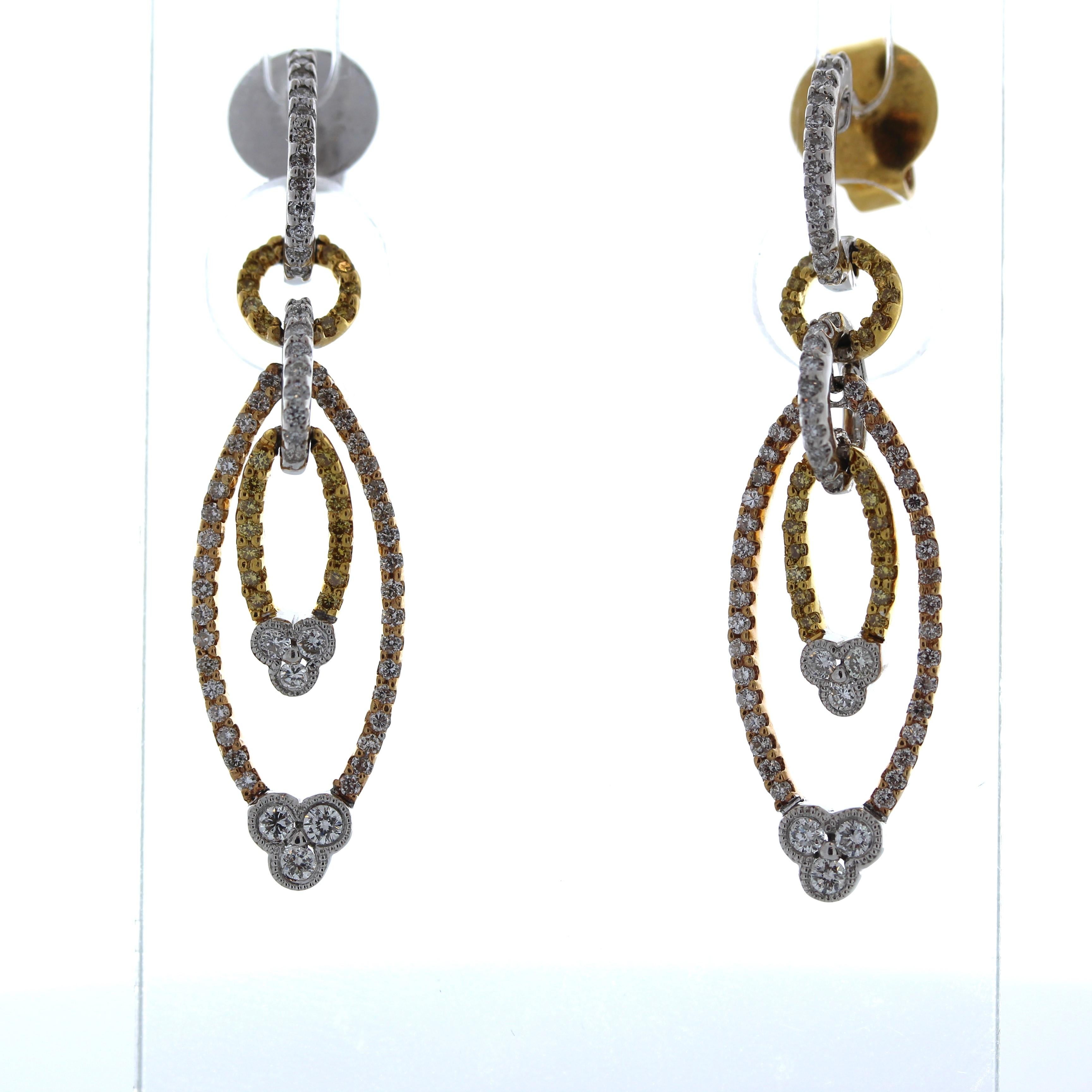Earrings made of 18k white gold or yellow gold with a main stone of round-cut diamonds weighing 1.50 carats would be an exquisite and luxurious choice. The 18k gold provides a durable and lustrous base for the earrings, while the diamonds add