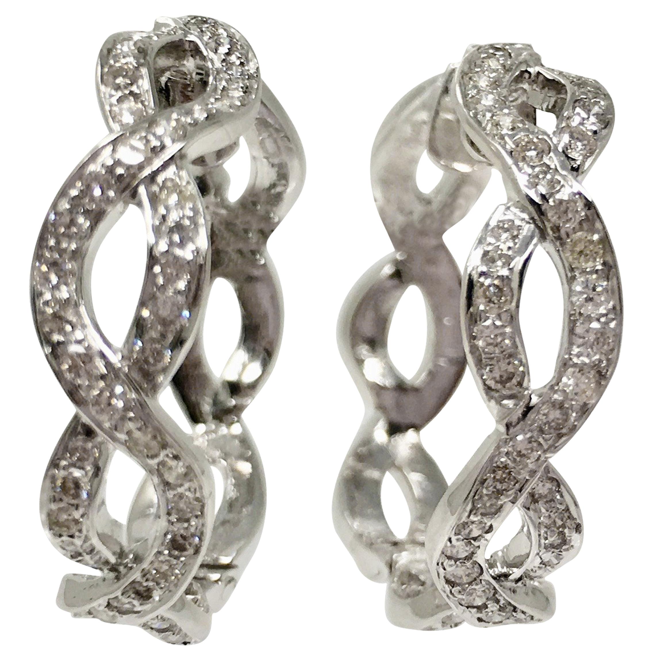 1.50 Carat White Diamond Hoop Earrings in 18 Karat White Gold For Sale
