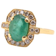 Vintage 1.50 carats emerald and brilliant cuts diamonds ring