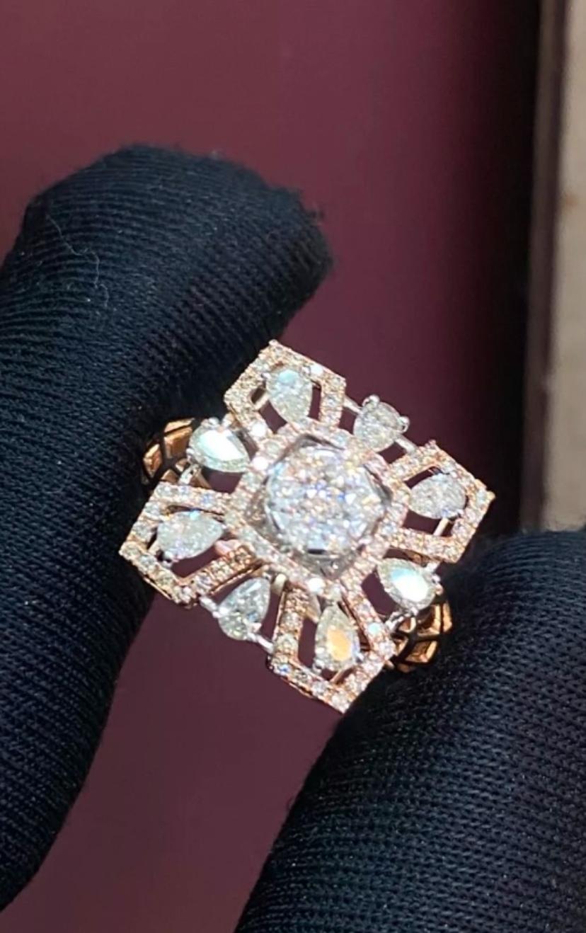 An exquisite Diamonds ring in intricate design, so elegant and refined .
Elevate your timeless of beauty and add  a touch of glamour and sophistication on your look.
Stunning ring cone in 14k rosè gold with Natural Diamonds of 1,50 carats, in