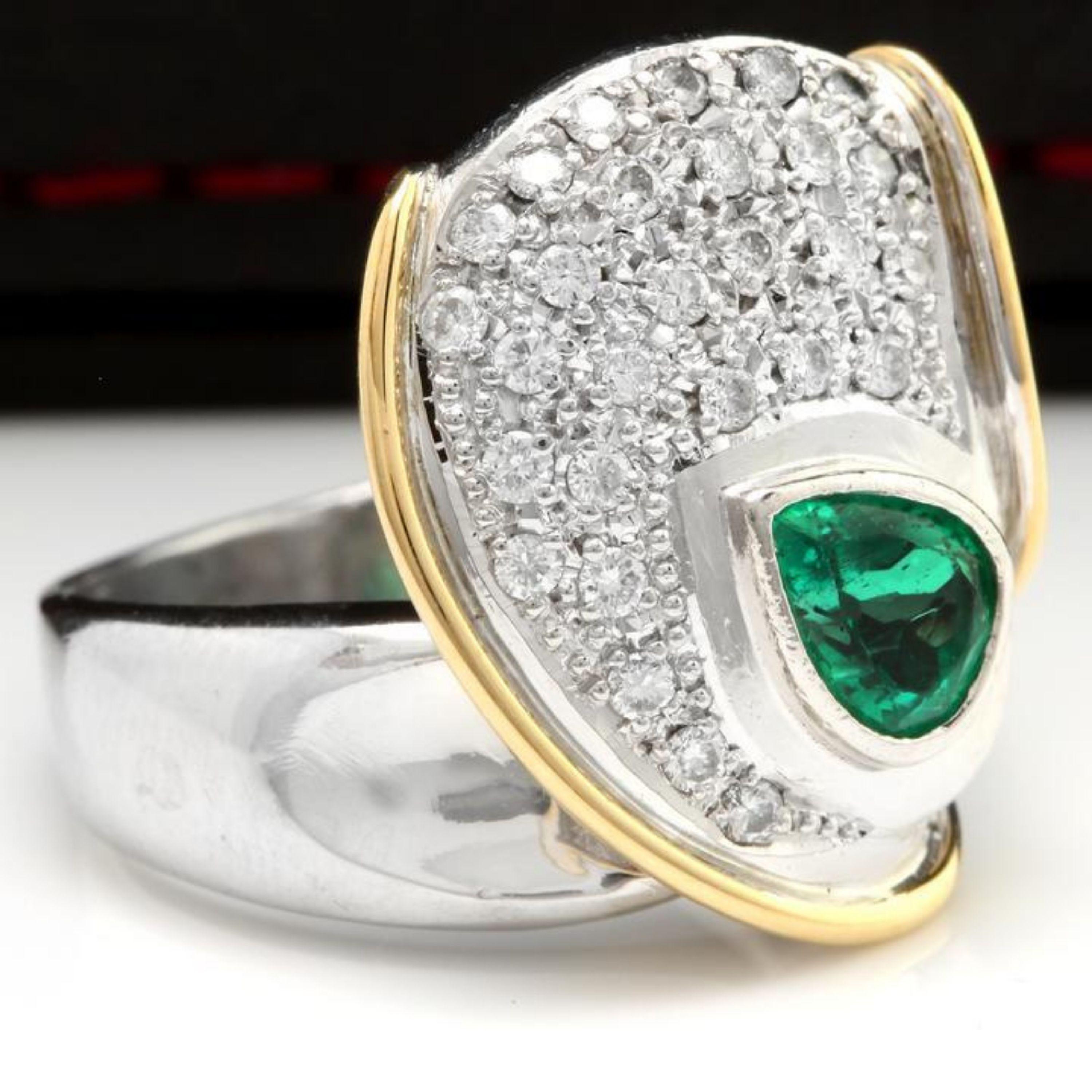 1.50 Carats Natural Emerald and Diamond Platinum Two-Tone Ring

Total Natural Pear Shaped Green Emerald Weight is: 1.00 Carat (Museum Grade)

Emerald Measures: 8.20 x 6.30mm

Head of the Ring Measures: 20.40 x 16.18mm

Natural Round Diamonds Weight: