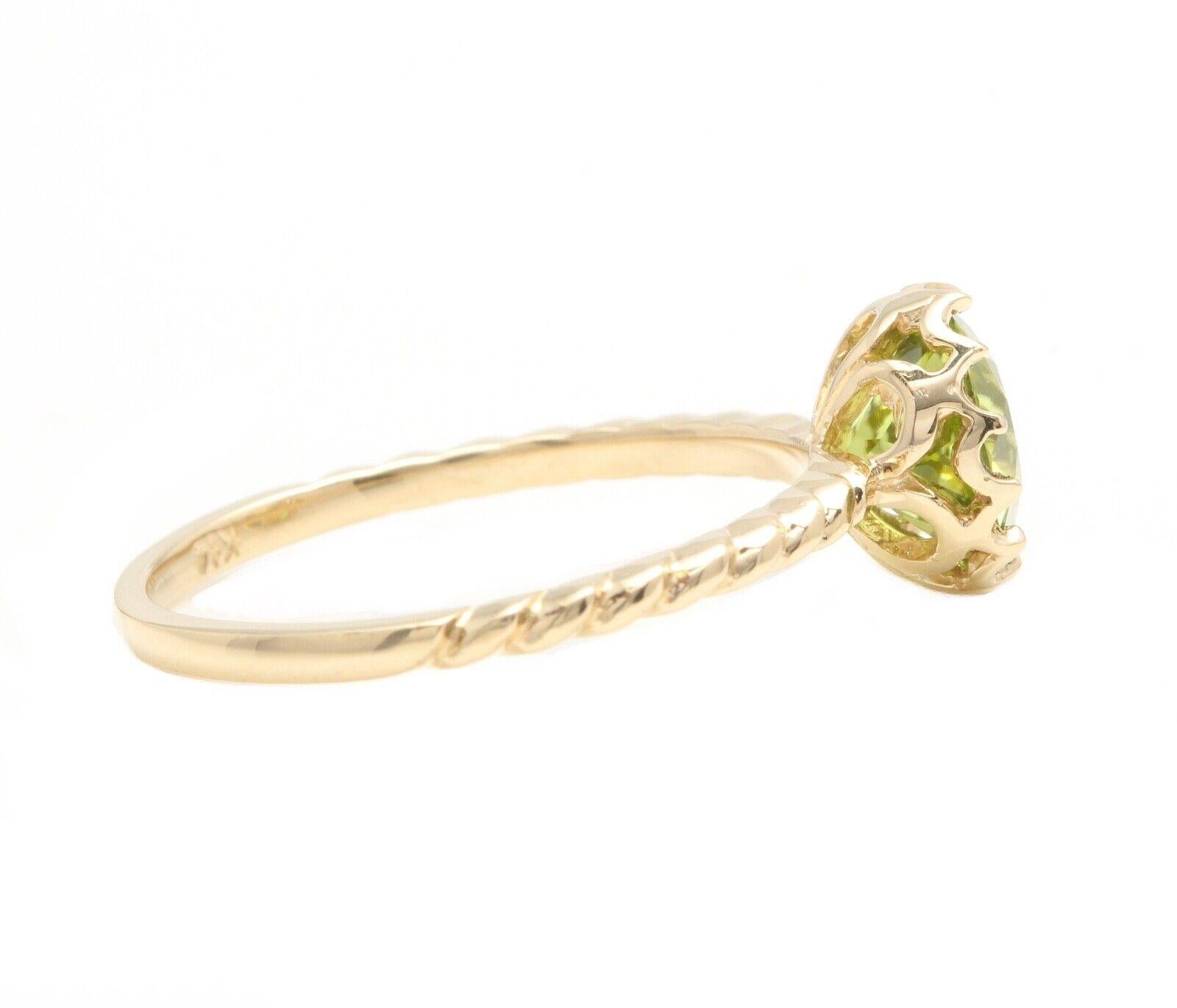 1.50 Carats Exquisite Natural Peridot 14K Solid Yellow Gold Ring

Total Natural Peridot Weight is: Approx. 1.50 Carats 

Peridot Measures: Approx. 7.00 mm

Ring size: 7 (we offer free re-sizing upon request)

Ring total weight: Approx. 2.0