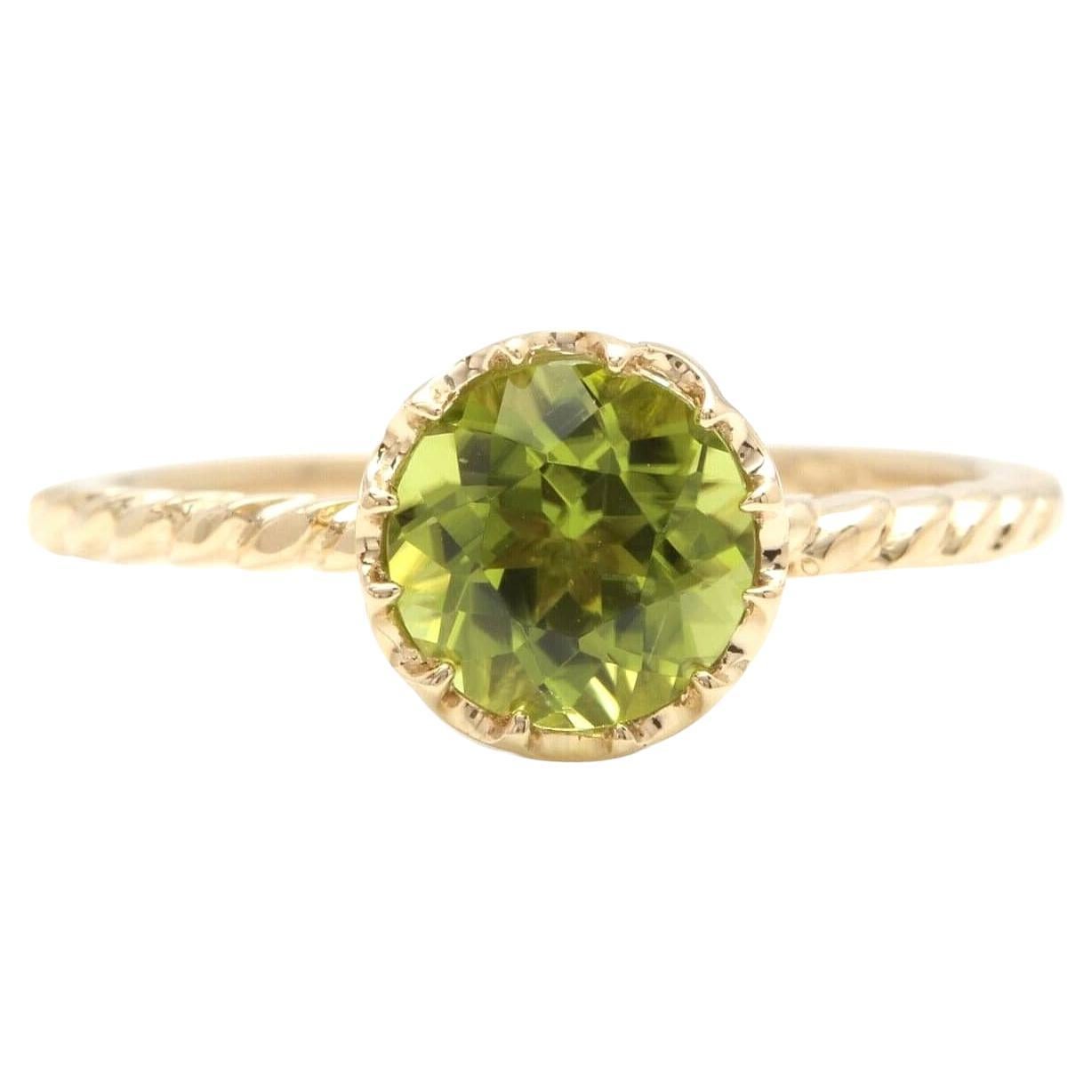 Anillo de oro amarillo macizo de 14 quilates con peridoto natural de 1,50 quilates
