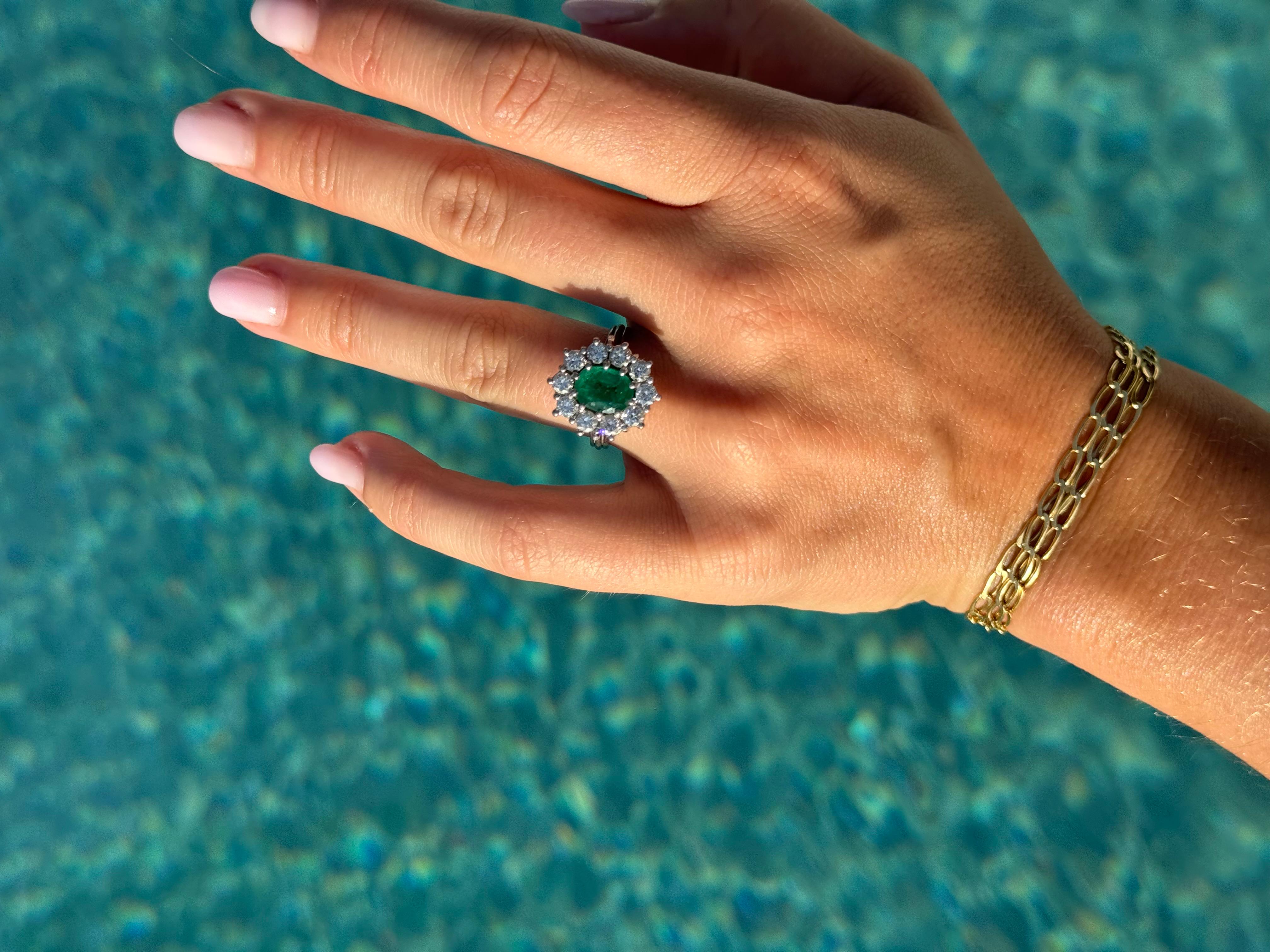 1.50 Carats oval Emerald and diamond cluster ring For Sale 5