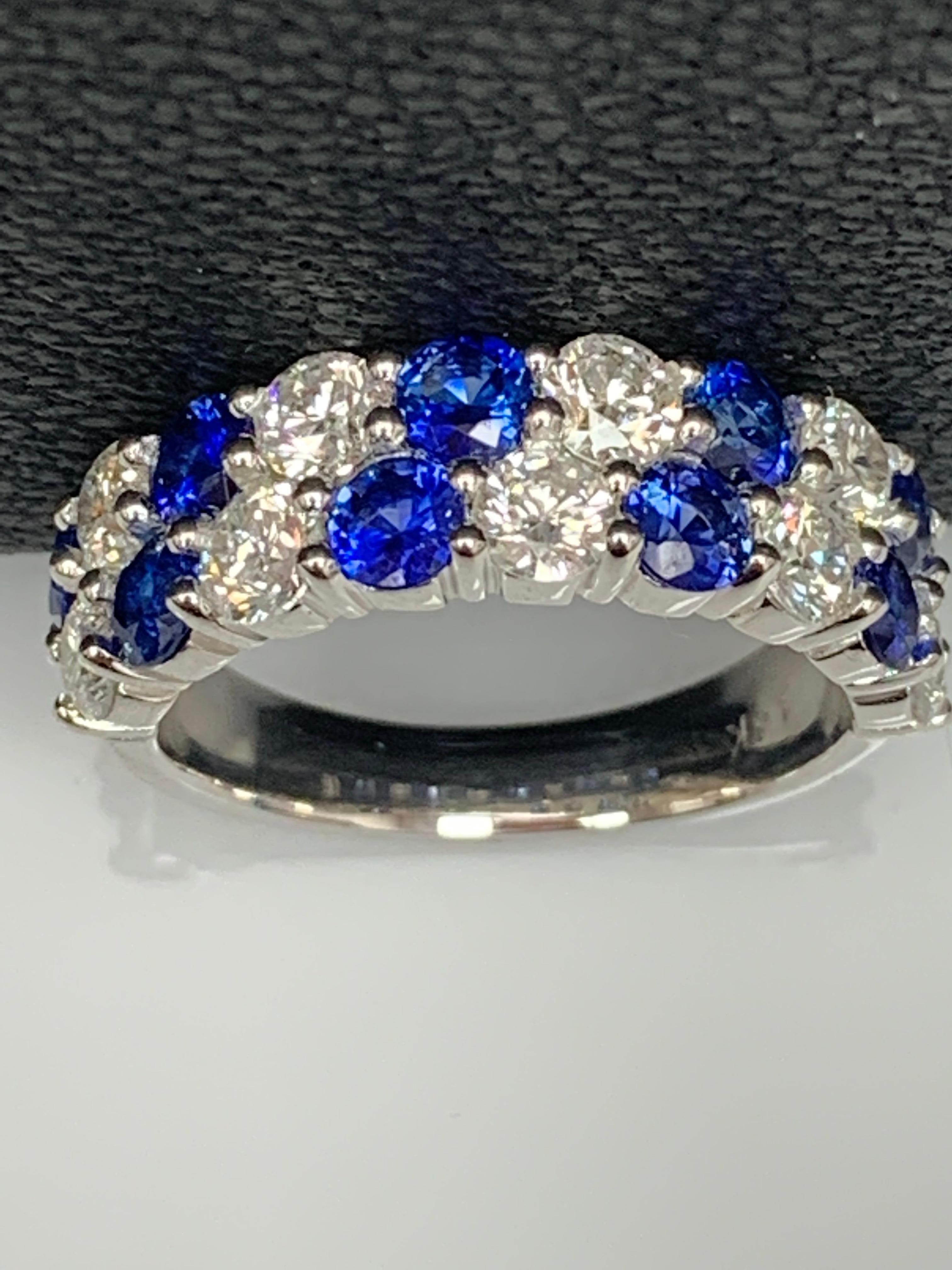 A unique and fashionable ZicZac ring showcasing two rows of round-shape 10 blue sapphires and 9 diamonds, set in a band design. Rubies weigh 1.50 carats and Diamonds weigh 1.52 carats total. A brilliant and masterfully-made piece.

Style available