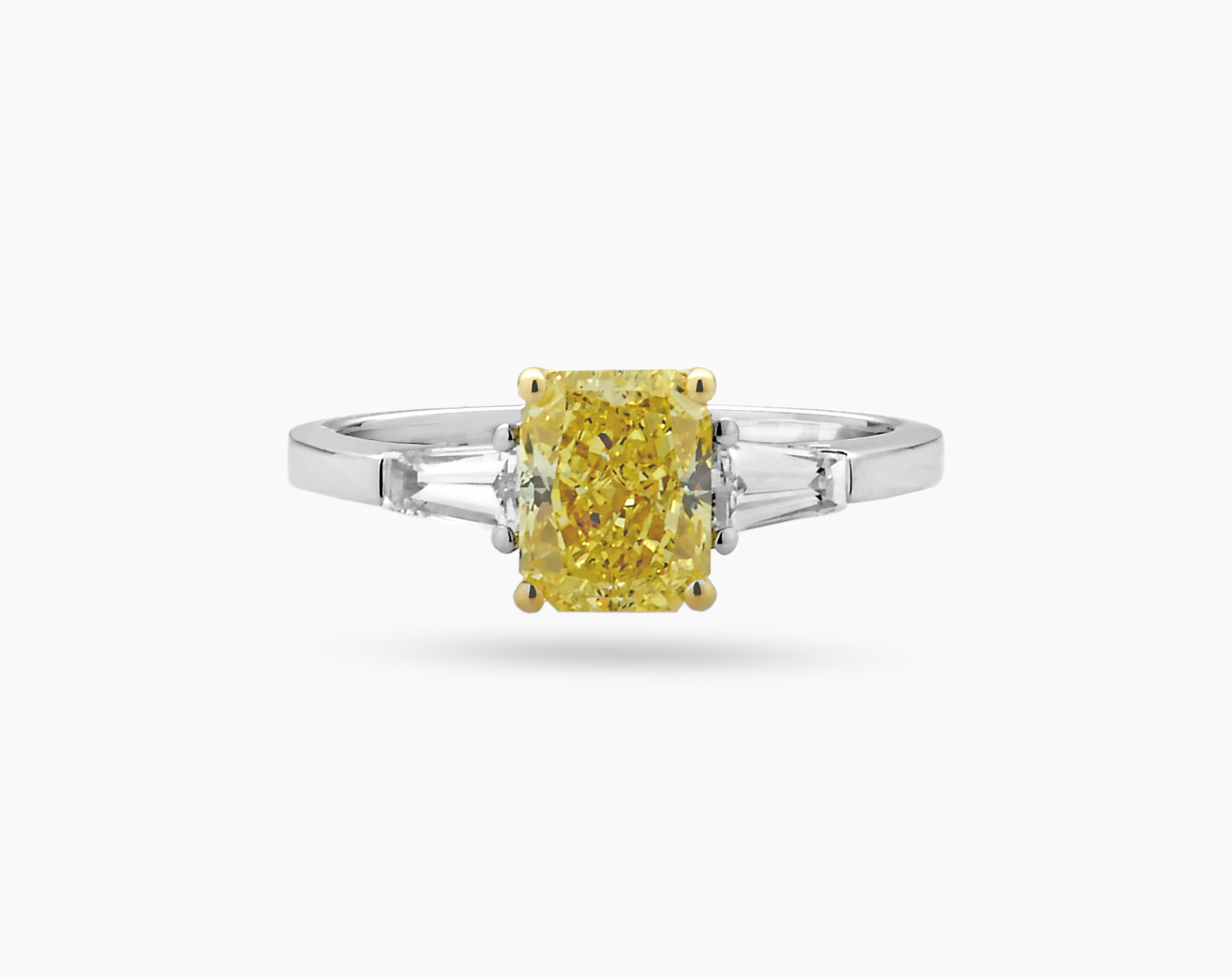 Contemporary 1.50 ct Fancy Vivid Yellow Radiant Shape and Tapers Engagement Diamond Ring For Sale