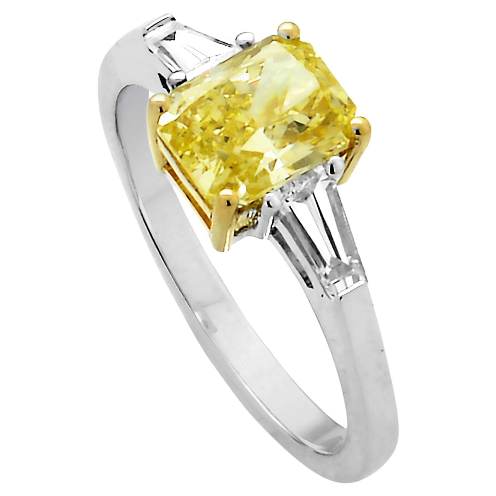 1.50 ct Fancy Vivid Yellow Radiant Shape and Tapers Engagement Diamond Ring For Sale