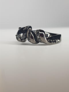 1.50 cts black diamond on "Ribbon"  18 kt gold d'Avossa Ring