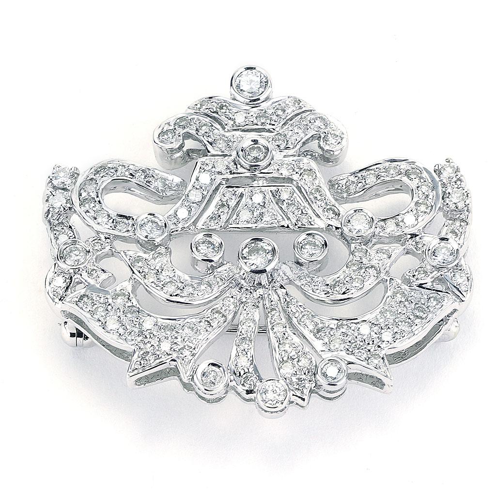 This pin is made of 18K white gold and weighs 6.80 DWT (approx. 10.58 grams). It contains 130 round G-H color and SI clarity diamonds weighing 1.50 CTTW. Dimensions: 1.25