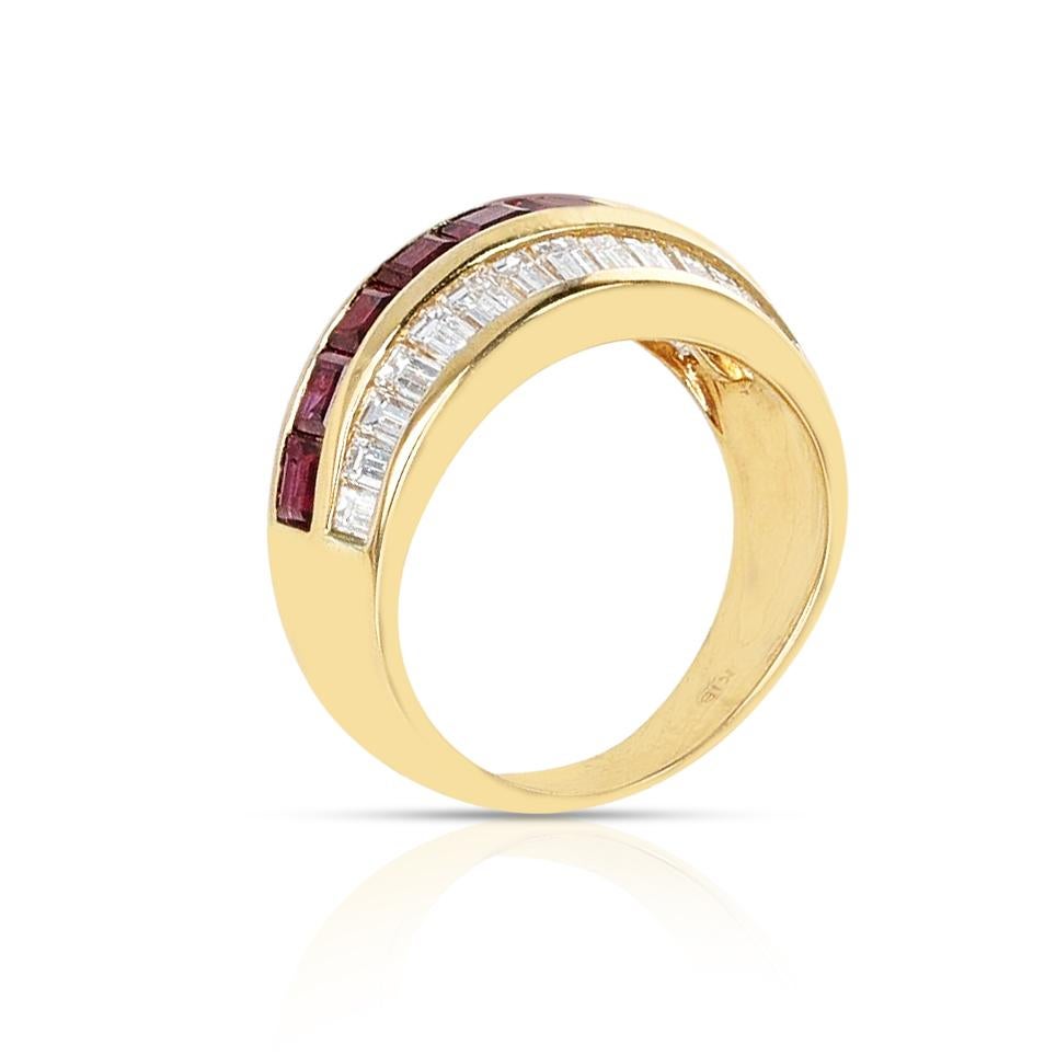 A beautiful diamond, ruby and diamond three row ring. The ring is made in 18 Karat Yellow Gold. The total diamond weight is appx. 1.50 carats, and the total weight of the ruby is appx. 1.22 carats. The ring size is 4.75 US. The total weight of the