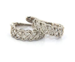 1.50 Ctw Shared Prong Diamond Swirl Earrings in 14K White Gold