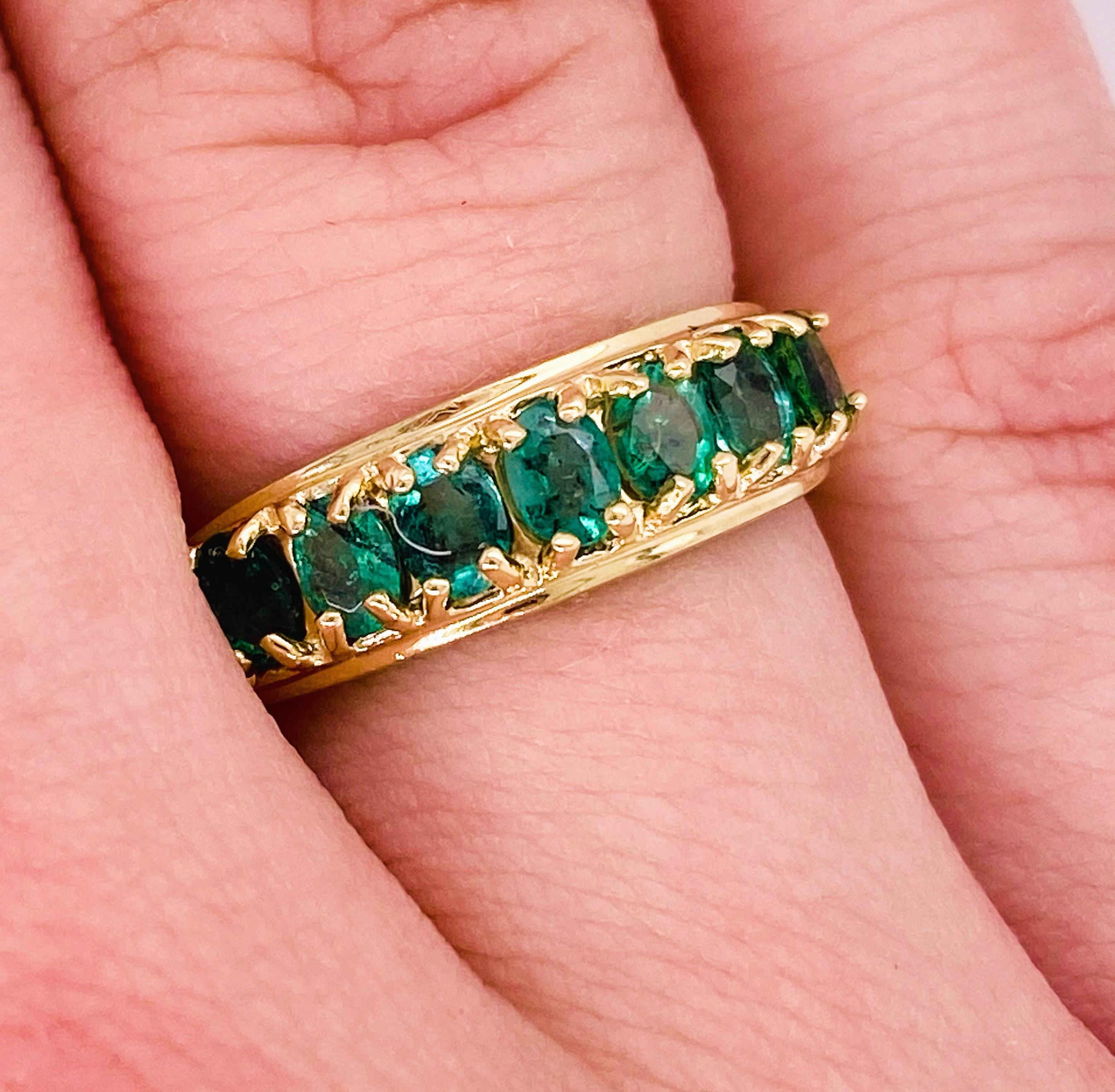 Seven vibrant emeralds have never looked better! This emerald band has genuine, natural emerald gemstones. The stones are set in a 10 karat yellow gold band! Emeralds are the birthstone for May, making this ring the perfect birthday or anniversary