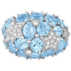 Bague dôme en or avec topaze bleue de 15 carats et diamants