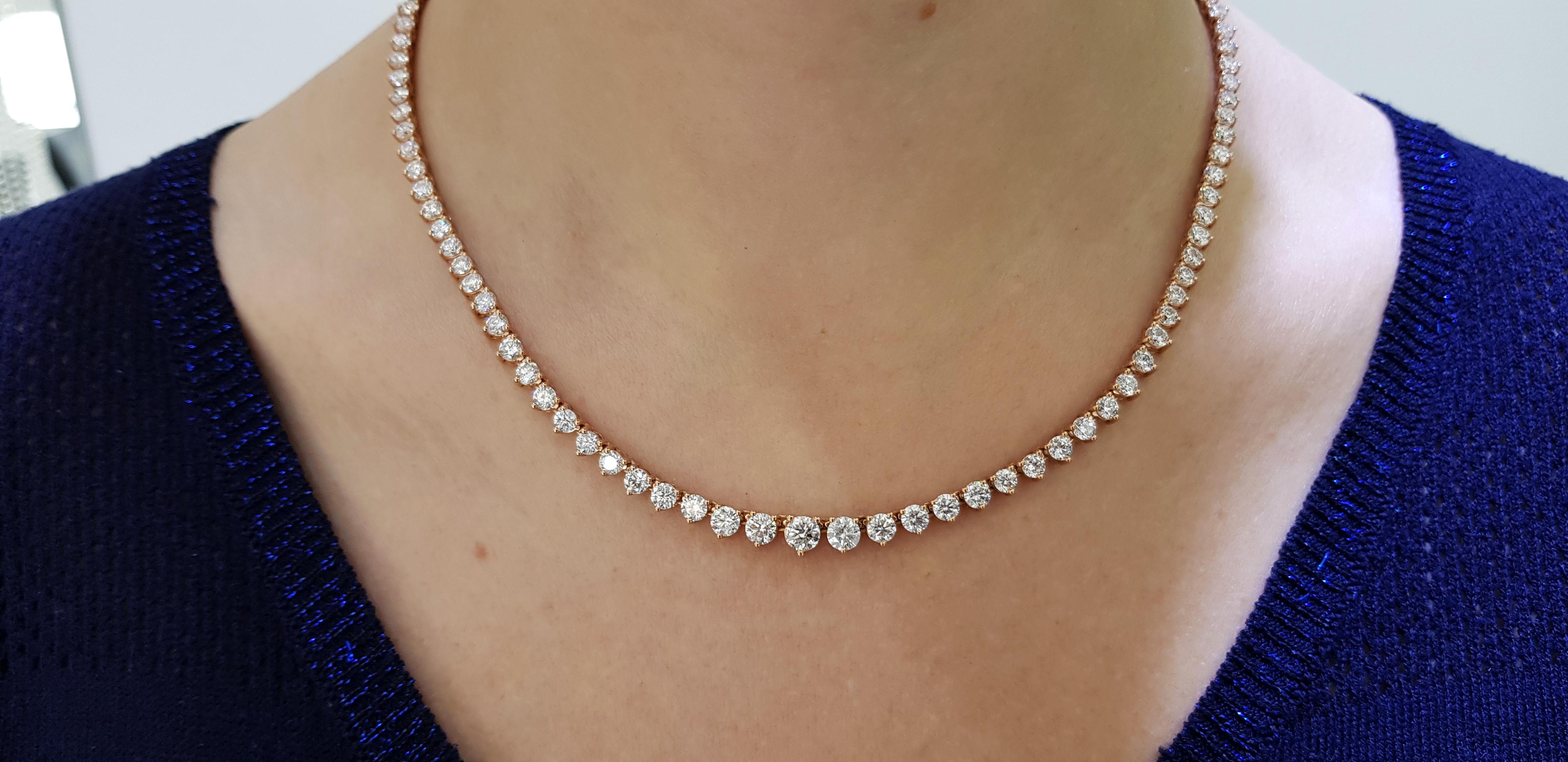 This stunning and impressive Riviera Necklace features total Diamond weight of 15.00 Carats in beautifully graduated Round Brilliant Cut gems with a sparkly white color G/H clarity SI1. Each stone has a three claw setting with open gallery and set
