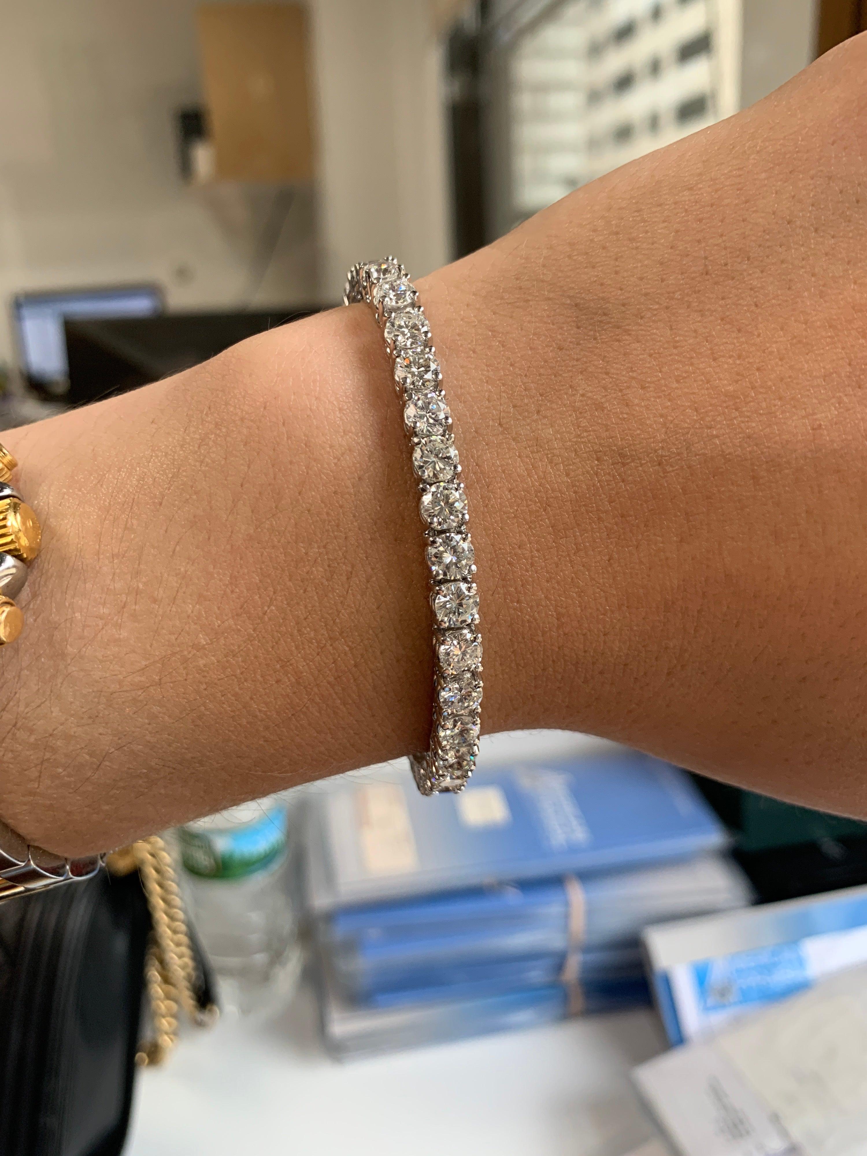 This important diamond tennis bracelet features 15.00 Carats of round brilliant cut diamonds. Each stone is approximately 0.44 Carats. 34 stones in total. Ideal cut diamonds 

Each stone is top color and clarity. H-I SI 

Every Woman Should Have One!