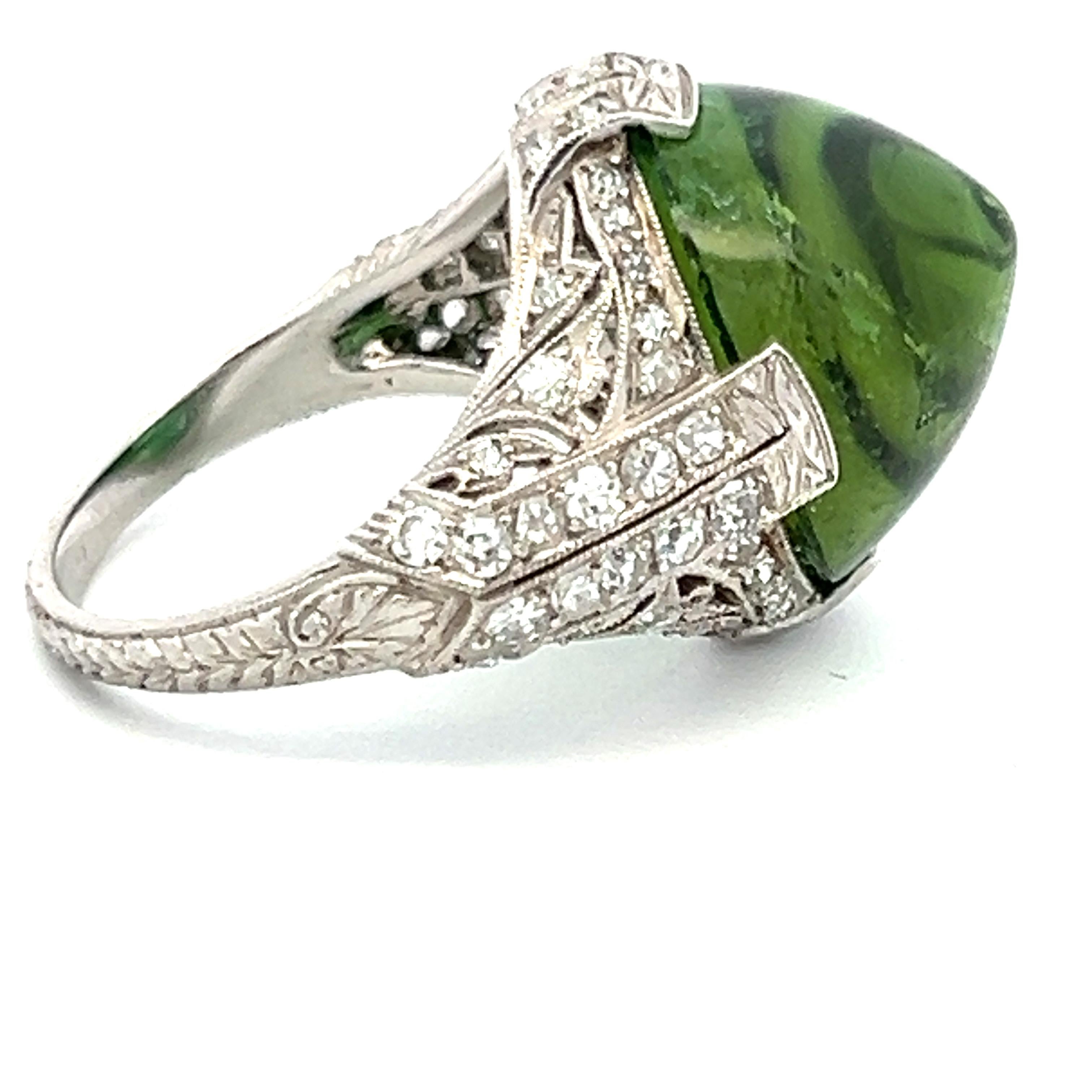 Title:
15.00 Carat Peridot 0.60 Carat Round Brilliant Diamond Platinum Cocktail Ring
Style:
Cocktail
Metal:
Platinum
Gemstone 1:
15 Carat PERI
Number of Stones:
1
Shape:
X
Gemstone 2:
0.6 Carat Diamond
Number of Stones:
64
Shape:
Round