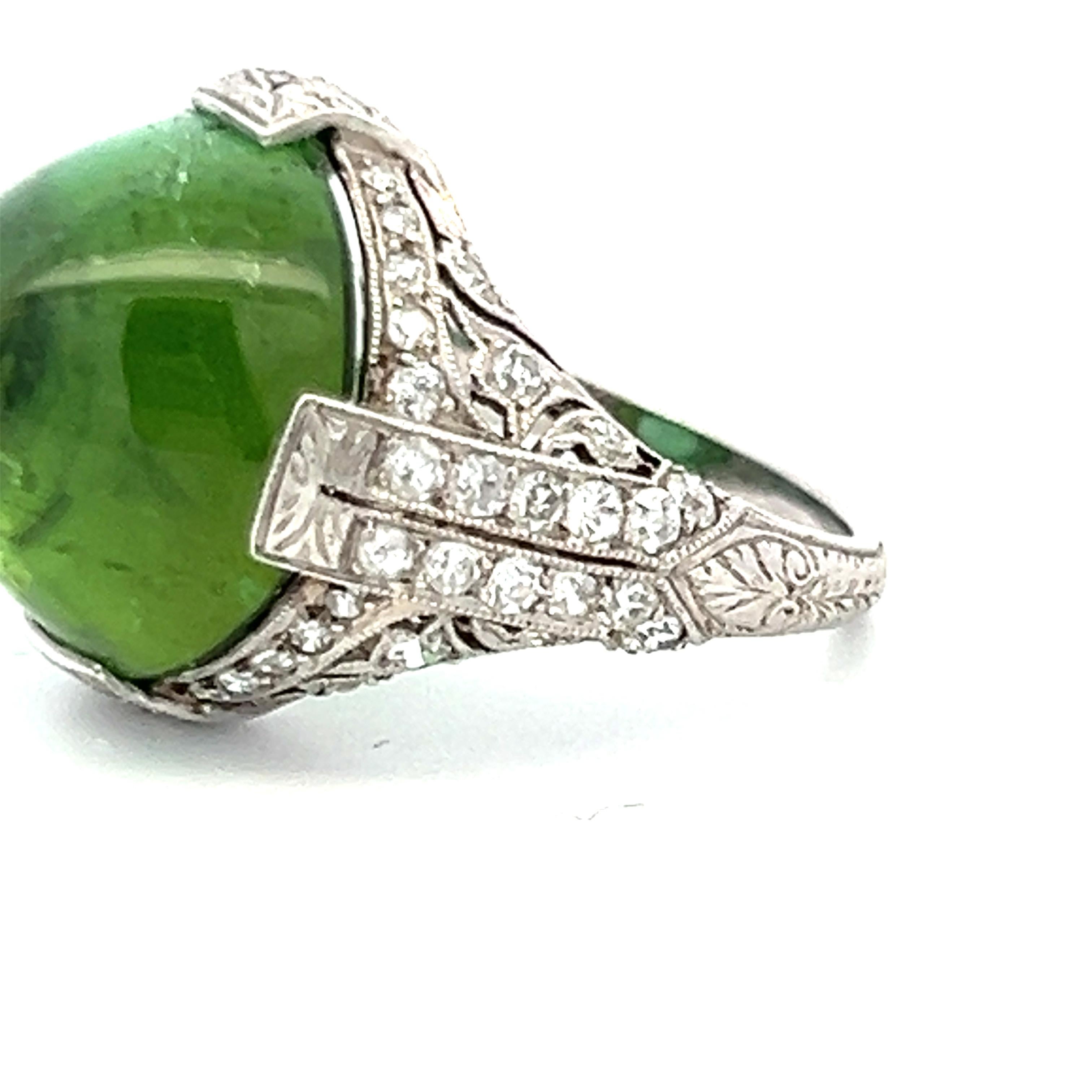 Brilliant Cut 15.00 Carat Peridot 0.60 Carat Round Brilliant Diamond Platinum Cocktail Ring For Sale