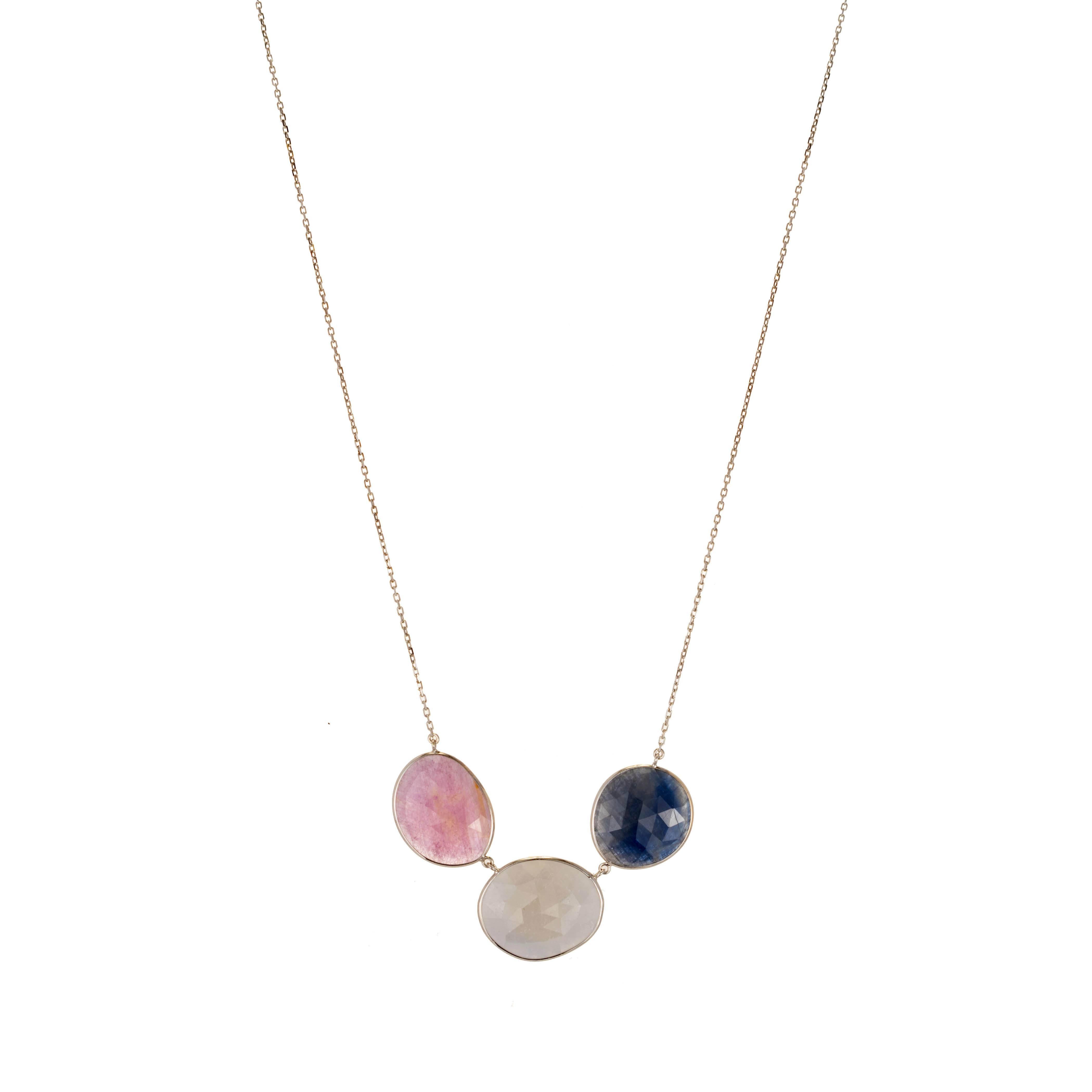 Pink, white and blue Sapphire slices, rose cut bezel set necklace. 14k white gold 18 inch cable chain. 

1 white Sapphire slice, approx. total weight 6.00cts, 20 x 15 x 3.5mm
1 blue Sapphire slice, approx. total weight 4.50cts, 20 x 15 x 3.5mm
1