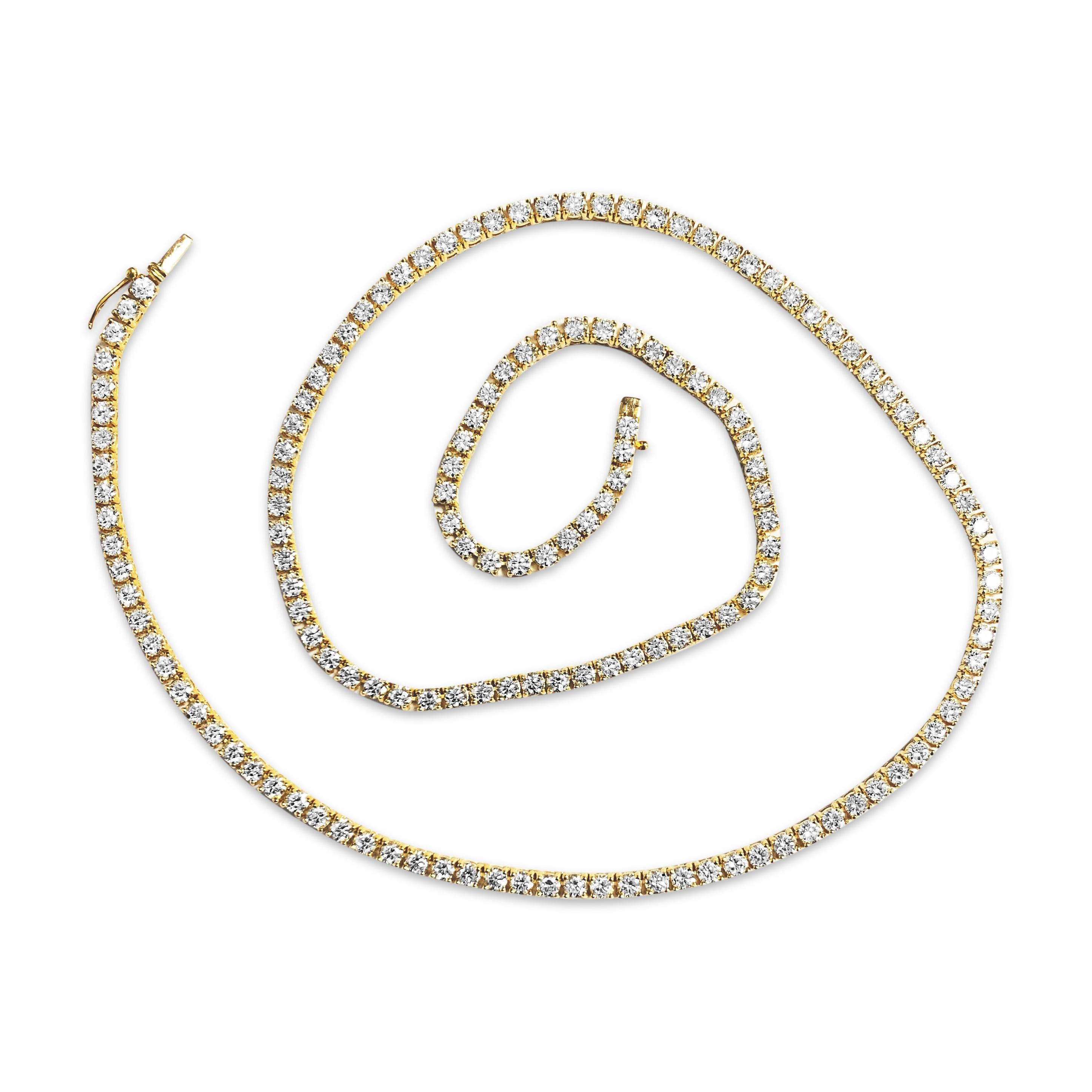 Crafted from luxurious 14k yellow gold, this stunning necklace features an impressive 15.00 carats of round brilliant cut diamonds, boasting VVS clarity and H color. Each diamond is meticulously set in secure prongs, creating a dazzling display of