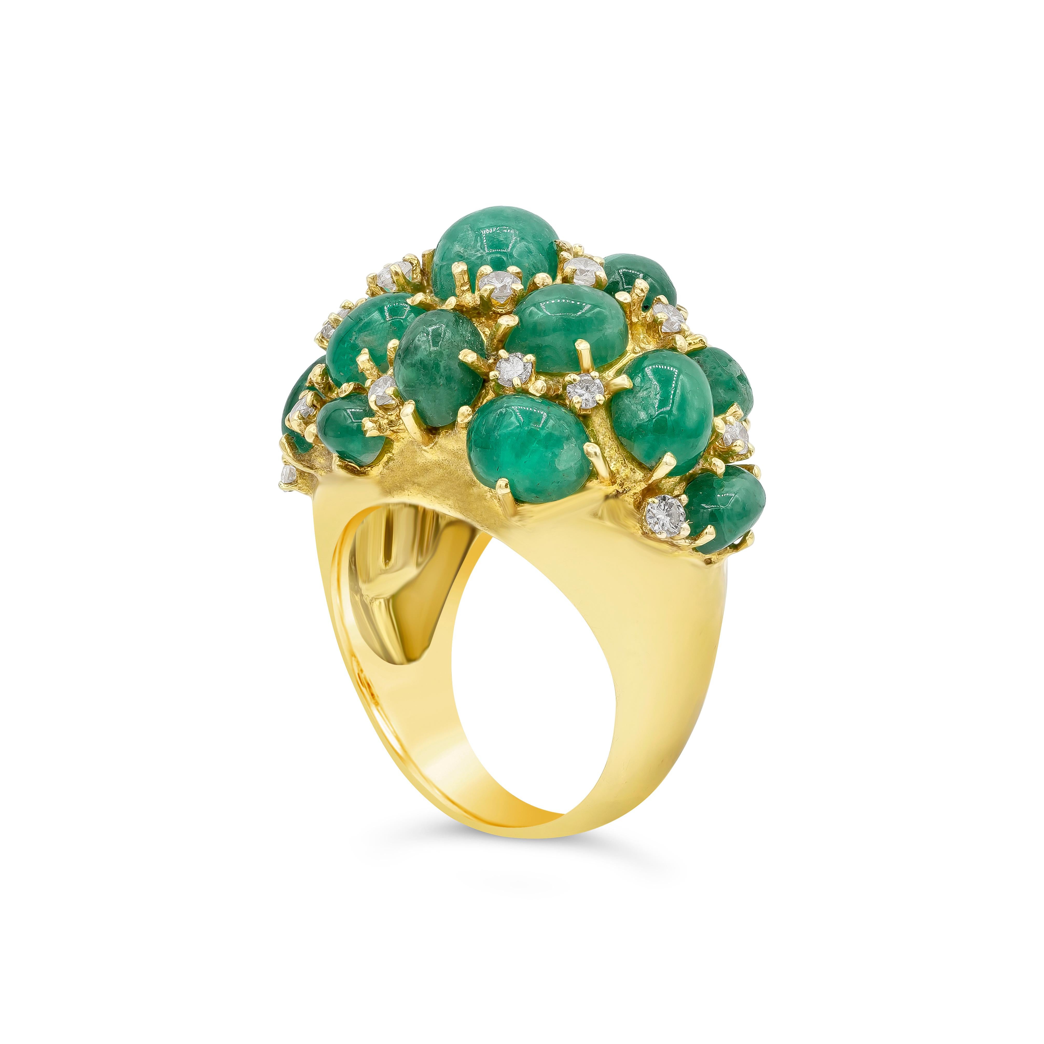 This uniquely designed fashion ring showcase 17 mixed cut emerald that weighs 15.00 total carats. Accented by 22 brilliant round diamonds that weighs 0.25 total carats. Made in 18 karats yellow gold. Size 7.5 US.