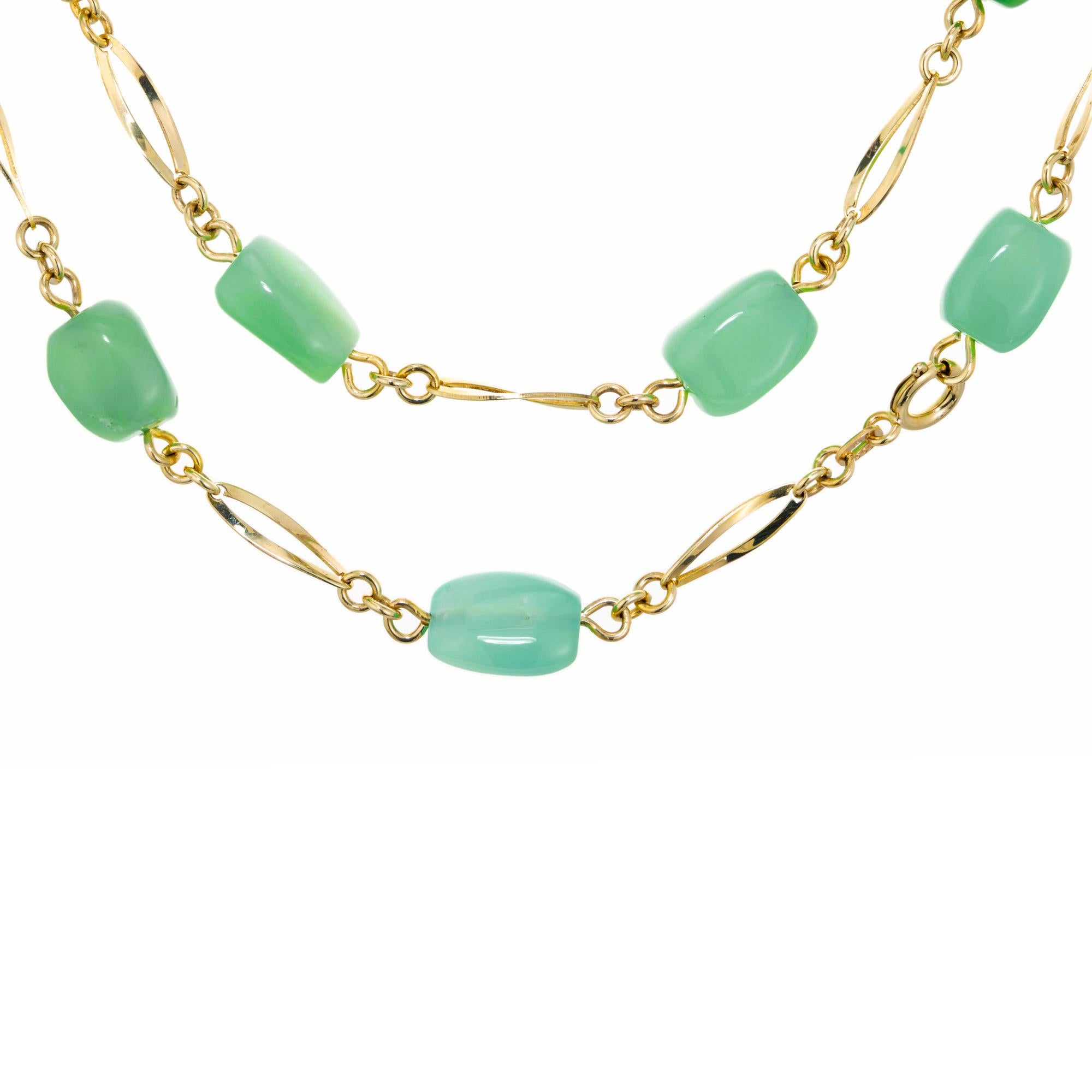 Unique and unusual green quartz necklace. 21 elongated green tumbled free form green quartz, connected by 8k yellow/green gold round and tear drop shape links. This beautiful piece originates from Scandinavia. Green gold of 8k purity (333 STAMPING).