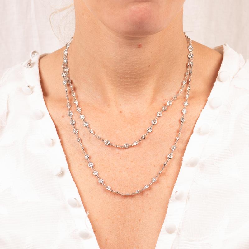 This is a beautiful necklace that can be worn so many ways. This necklace features 15.02 total carats of round brilliant diamonds set in 14kt white gold bezel on a 14kt white gold cable link chain. Lobster clasp closure. It is 36