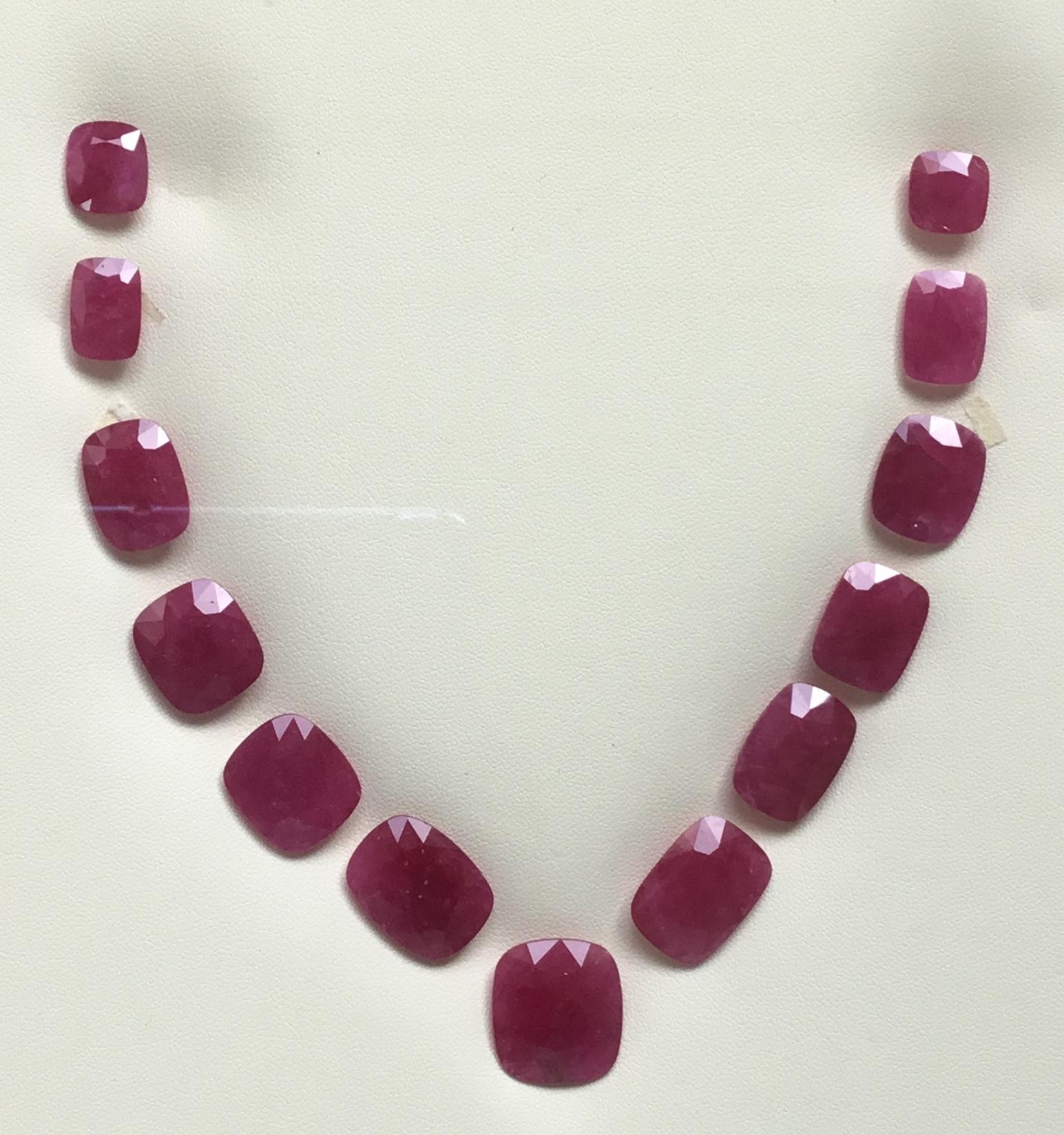 150.41 Carats Ruby Mozambique Cushion Faceted Cut stone Layout Heated Natural Gem

Poids : 150,41 carats
Pièces : 13
Forme : Pierre taillée en coussin à facettes
