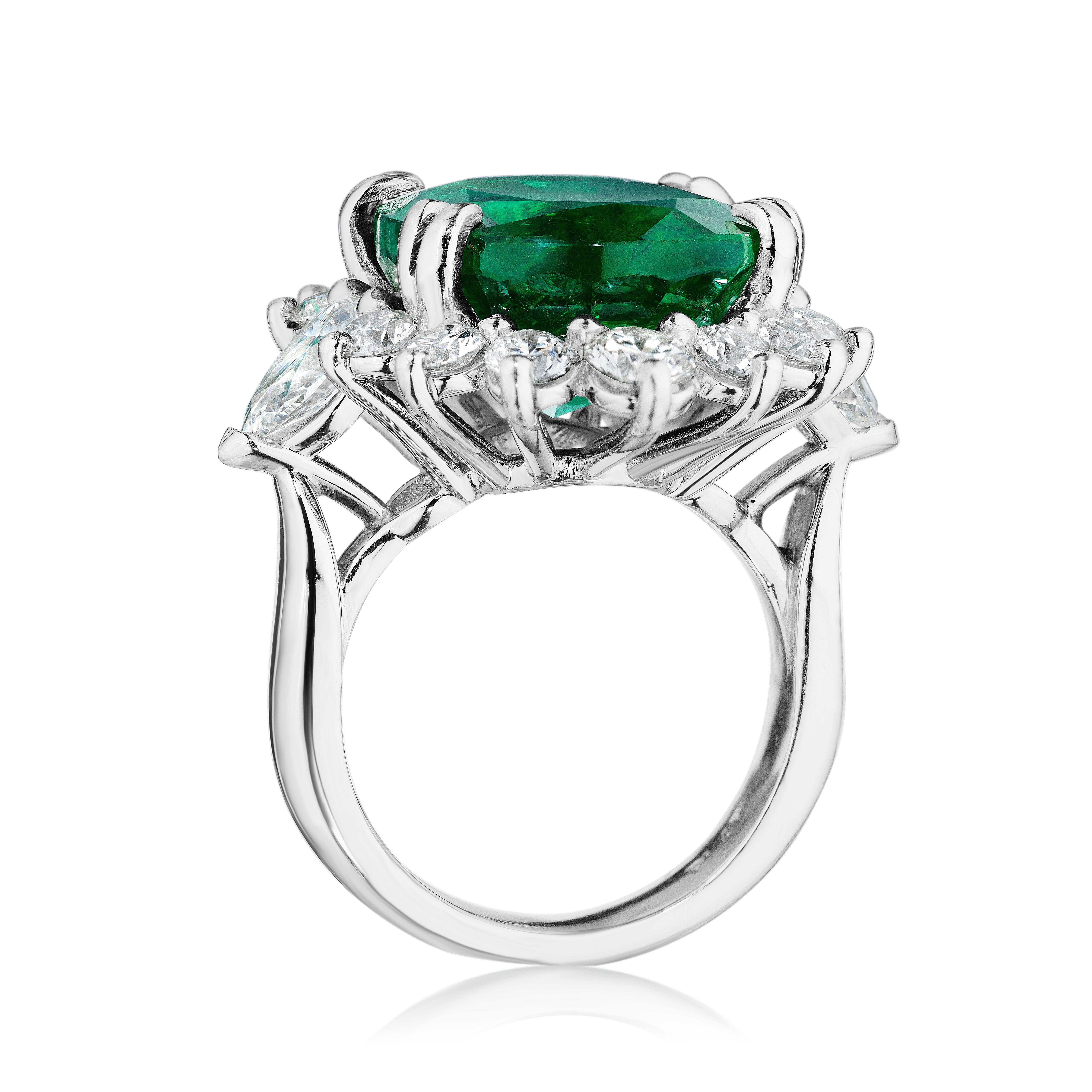 •	Platinum
•	Size 6.50

•	Number of Oval Emeralds: 1
•	Carat Weight: 15.05ctw
•	Color: Vivid Green
•	Minor Enhancement
•	Certificate: GRS, GRS2014-070723

•	Number of Pear Shape Diamonds: 2
•	Carat Weight: 1.40ctw
•	Color: F
•	Clarity: SI1
•	GIA: