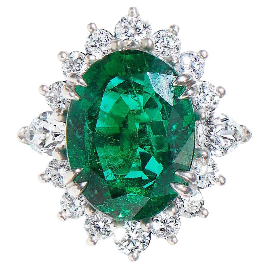 Bague halo de diamants en forme de poire et émeraude ovale 15,05 carats en vente