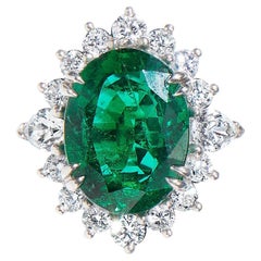 Bague halo de diamants en forme de poire et émeraude ovale 15,05 carats