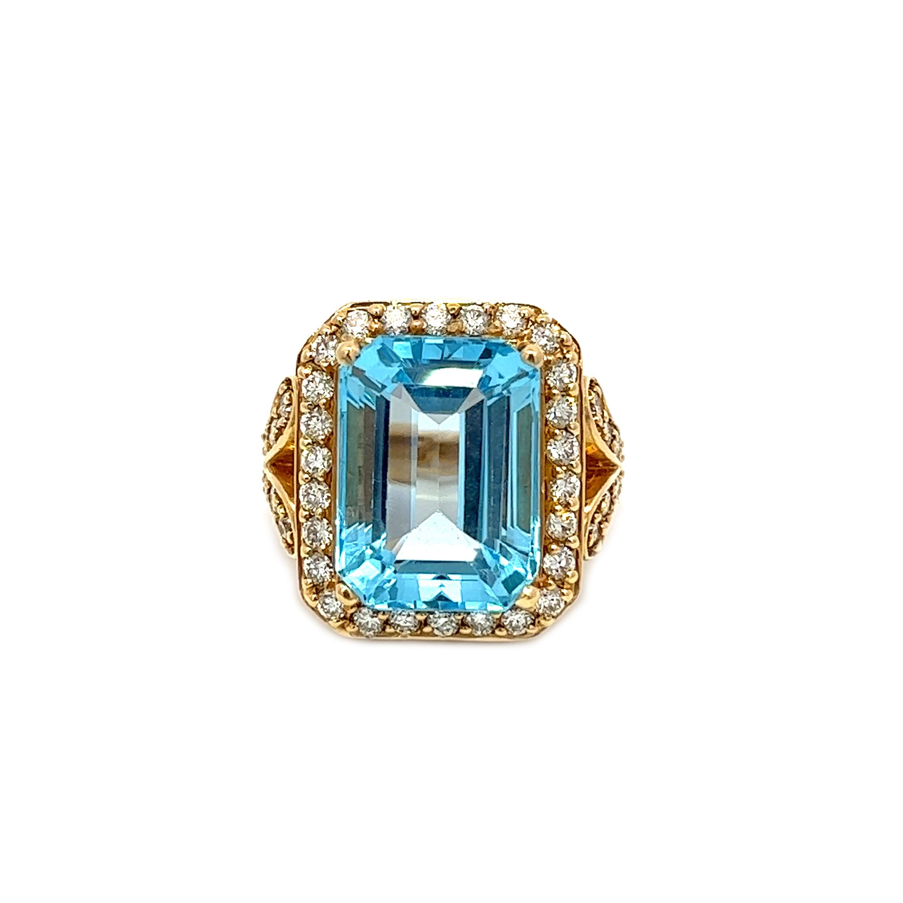 This magnificent 13.67ct cushion-cut blue topaz is elegantly encircled by a collection of round brilliant diamonds boasting H color and VS clarity, weighing a combined total of 1.40ct. The entirety of these resplendent stones are meticulously