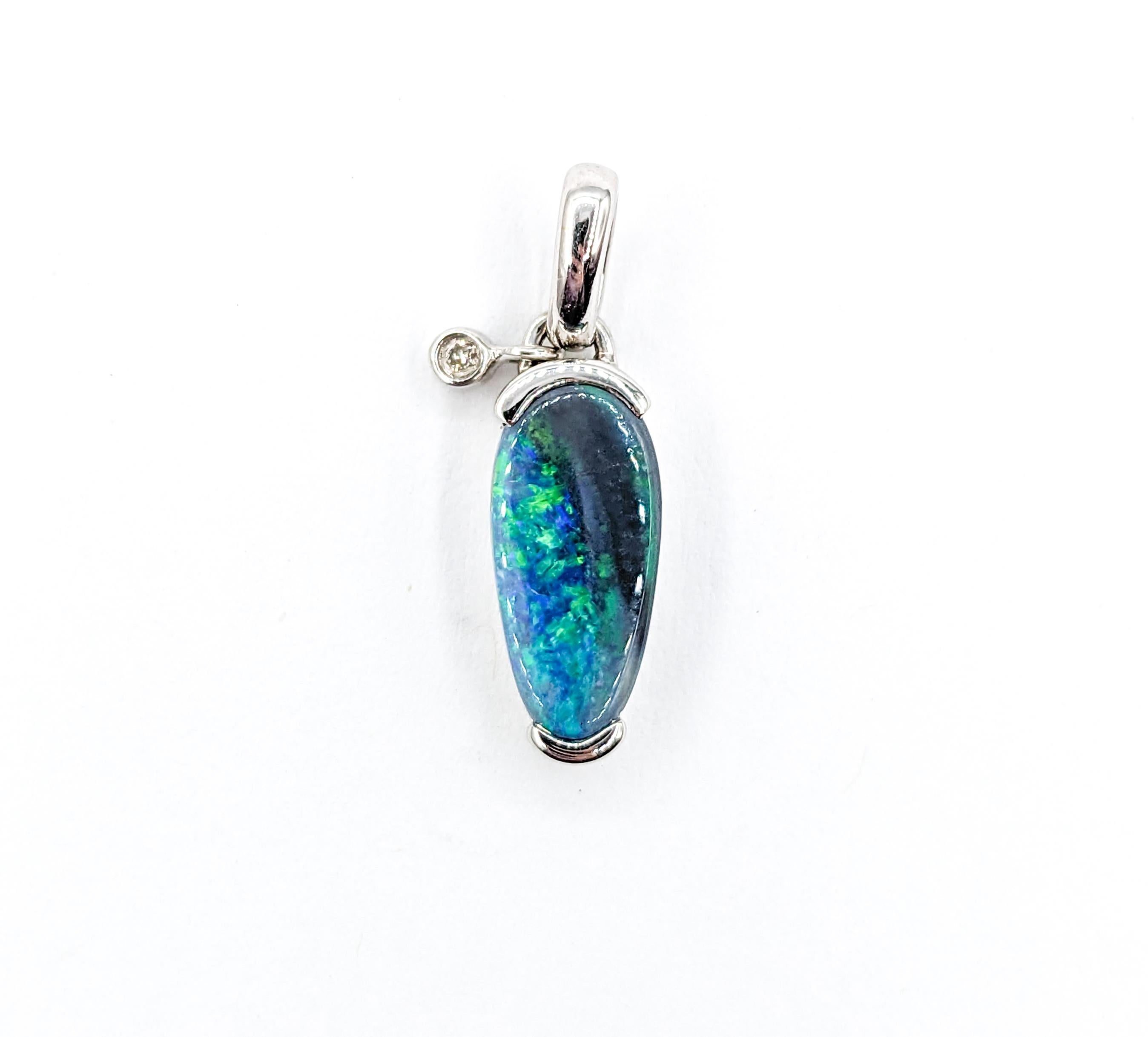 1.50ct Black Opal Pendant in White Gold

This pendant is an exquisite piece of jewelry crafted in 14kt white gold, featuring a sparkling 0.02ct diamond of I clarity and a near colorless white hue. At the heart of the pendant is a magnificent 1.50ct