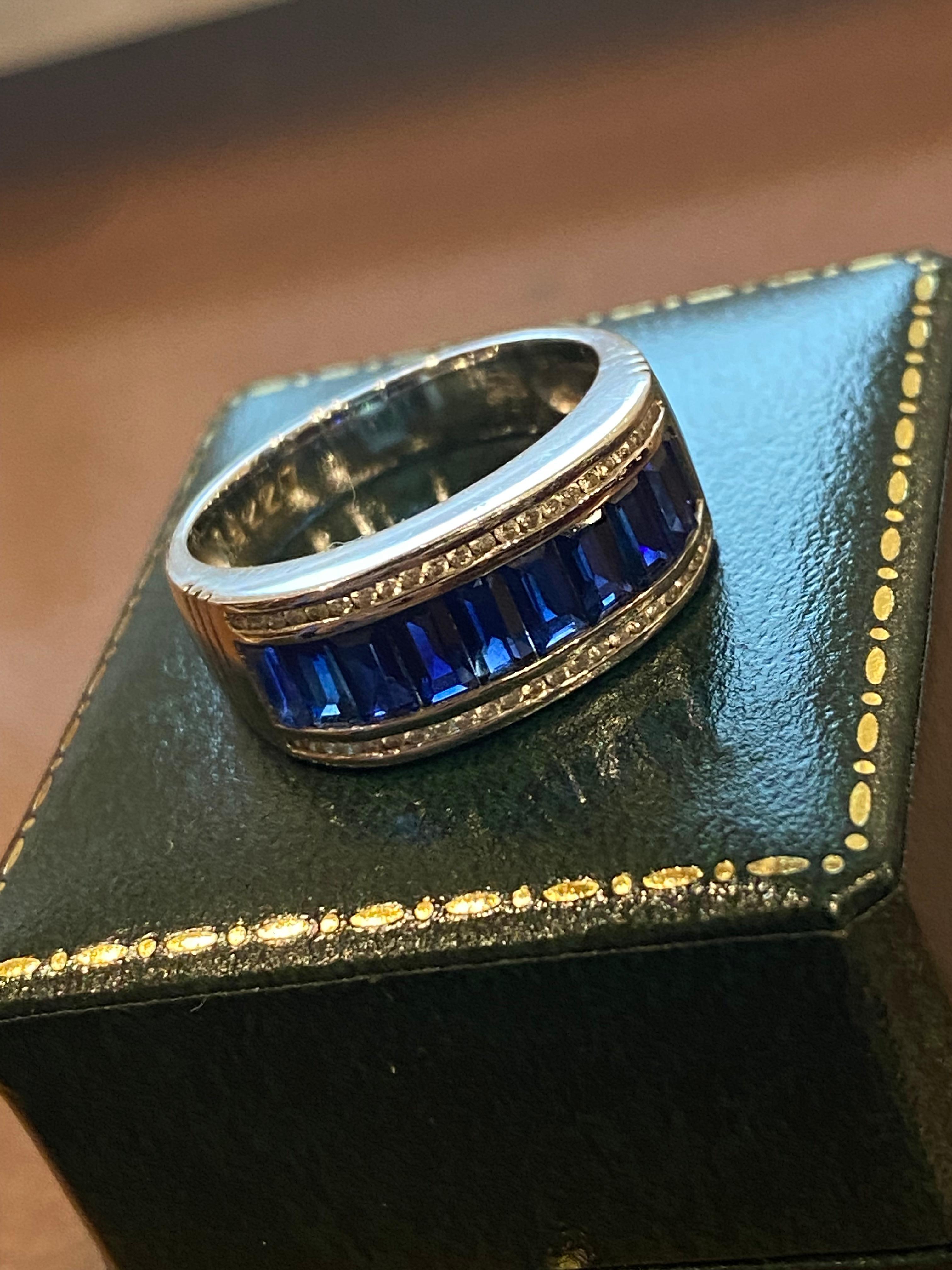 Elegantly channel-set with 10 Natural Sapphires
of vivid intense blue colour
of 1.50ct in total 
of excellent clarity 
of Ceylon origin, 

lavishly bordered by round diamonds (x 52)
of 0.60ct in total approx. 
of excellent colour & clarity 

finely