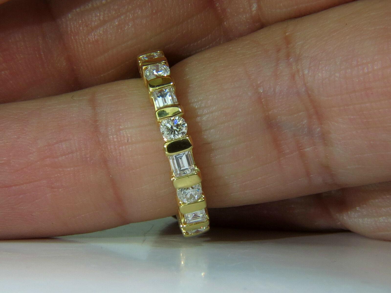1.50ct. Baguette & Rounds eternity band.

Side 5 3/4 (we may not resize).

G-H color

Vs-2 clarity

Channel set

3.3mm thick.

3.9 grams.

Durable Make.

14kt. yellow gold

$4000 Appraisal to accompany