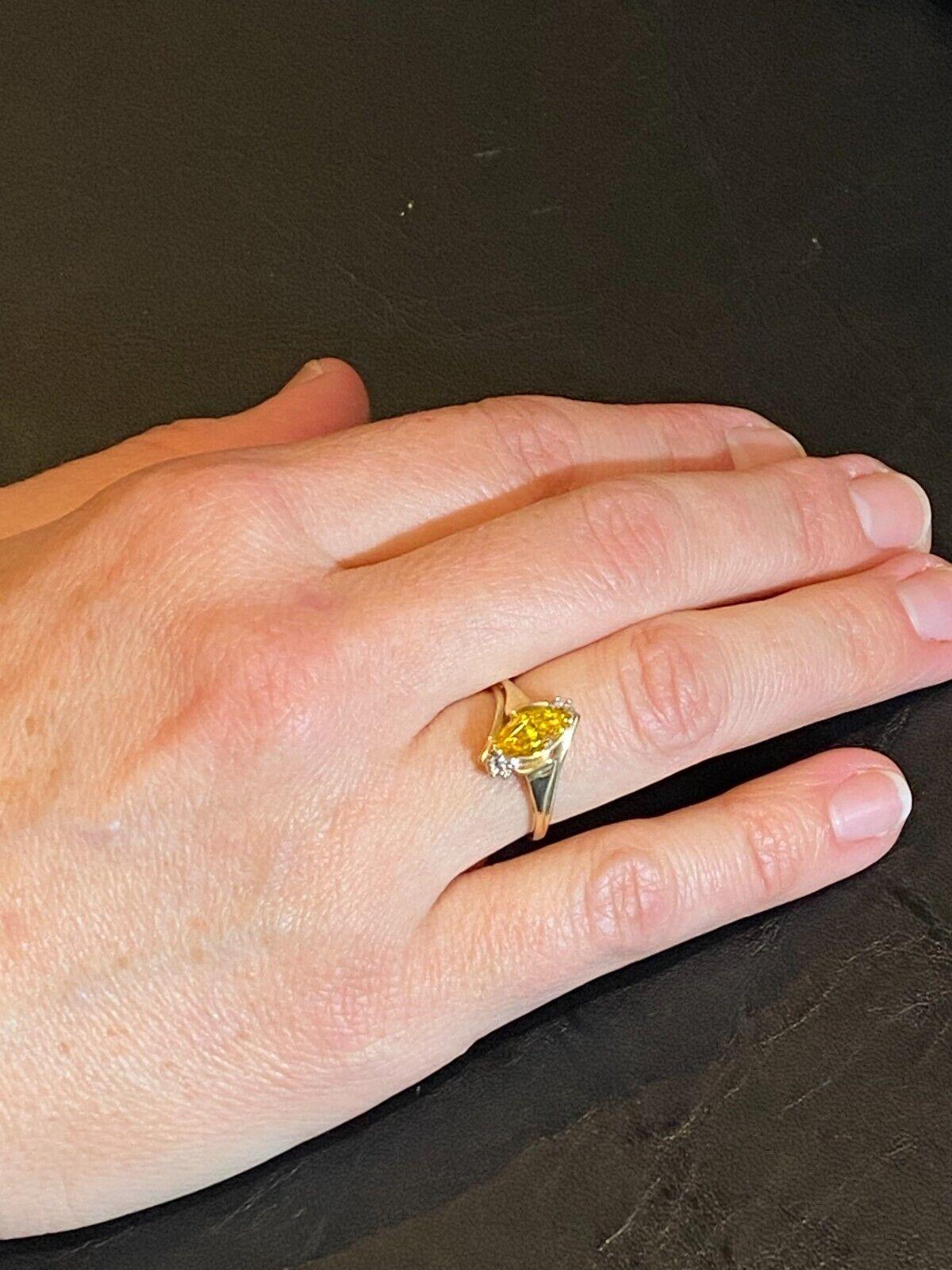 Women's 1.50ct Marquise Cut Golden Zirconia and Diamond ring in 14K Yellow Gold For Sale