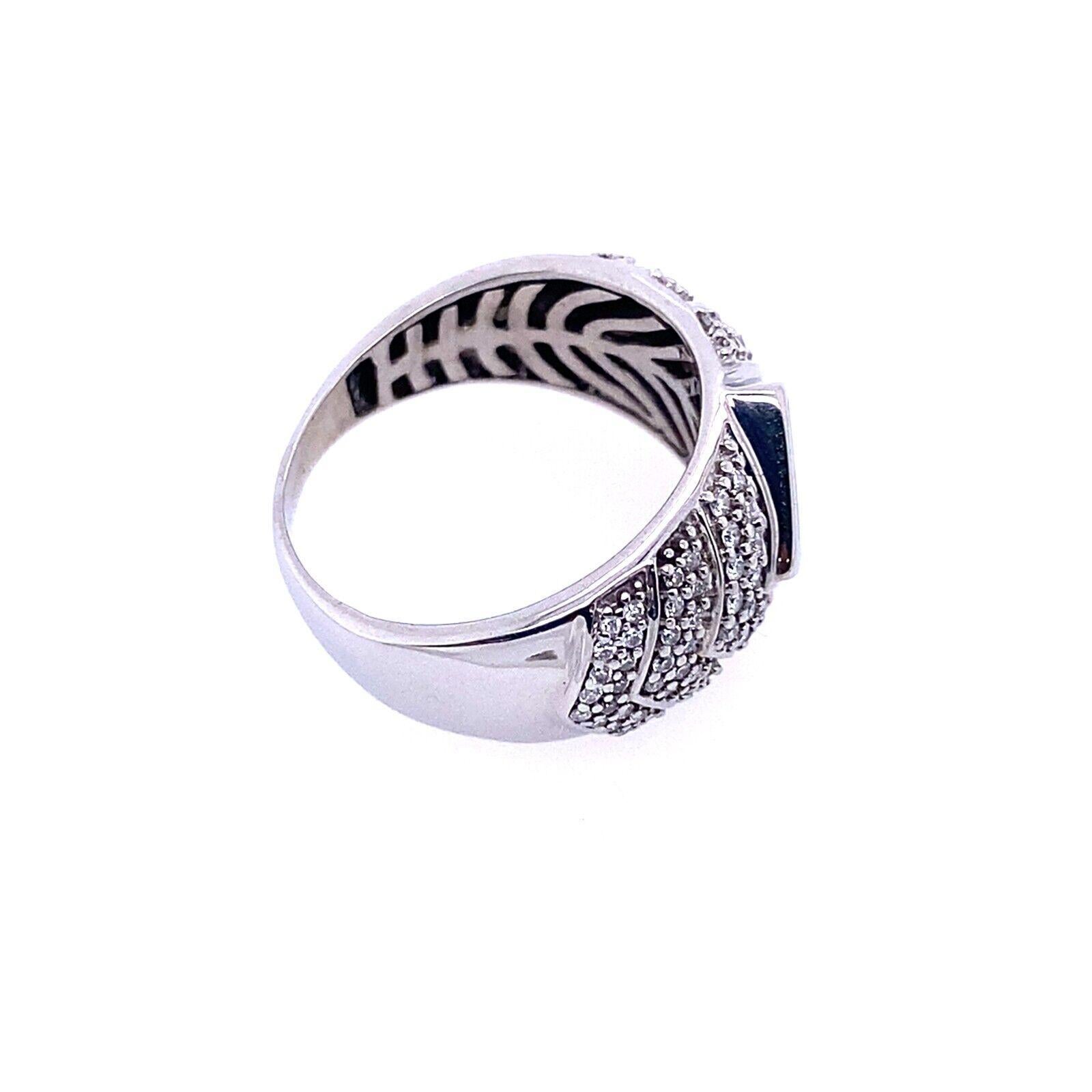 This unique and elegant Diamond ring is designed with a 0.75ct princess cut and 0.75ct Round Brilliant Cut Diamonds on a 14ct White Gold band. This ring is sure to be a timeless piece.

Additional Information: 
Total Diamond Weight: 1.50ct
Diamond